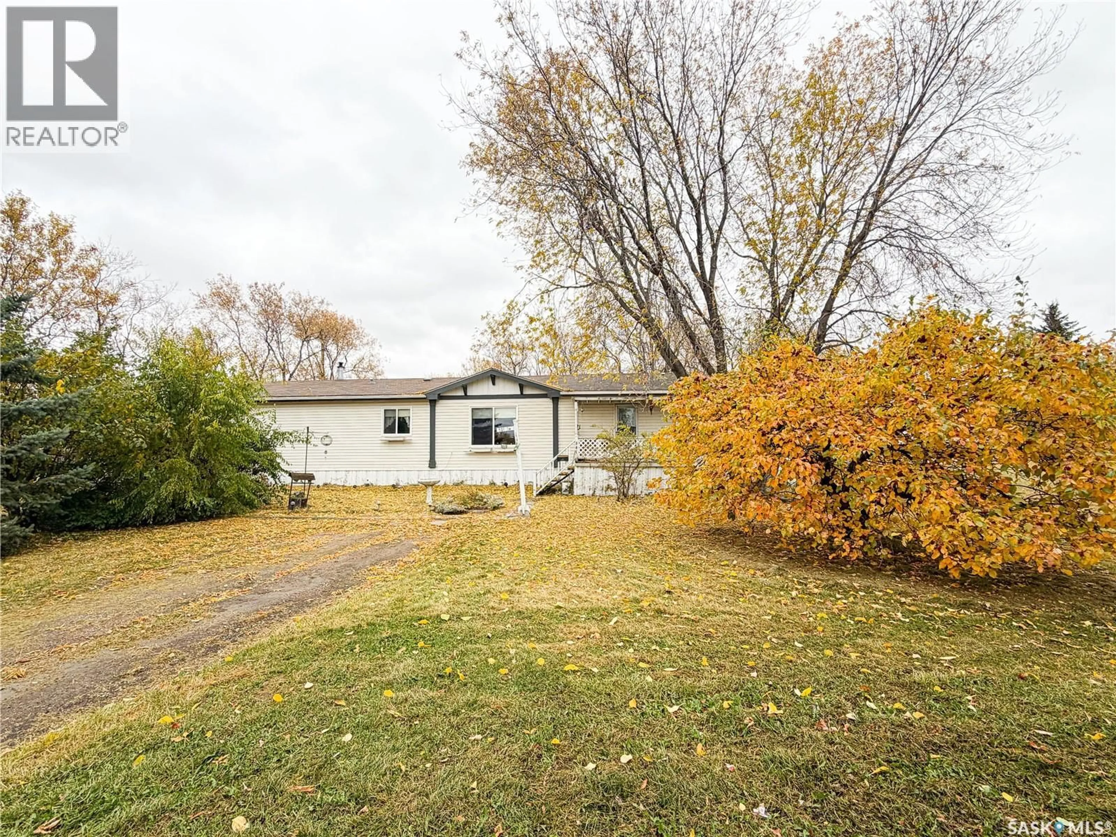 A pic from outside/outdoor area/front of a property/back of a property/a pic from drone, unknown for E - 501 7TH AVENUE, Meadow Lake Saskatchewan S9X1X9