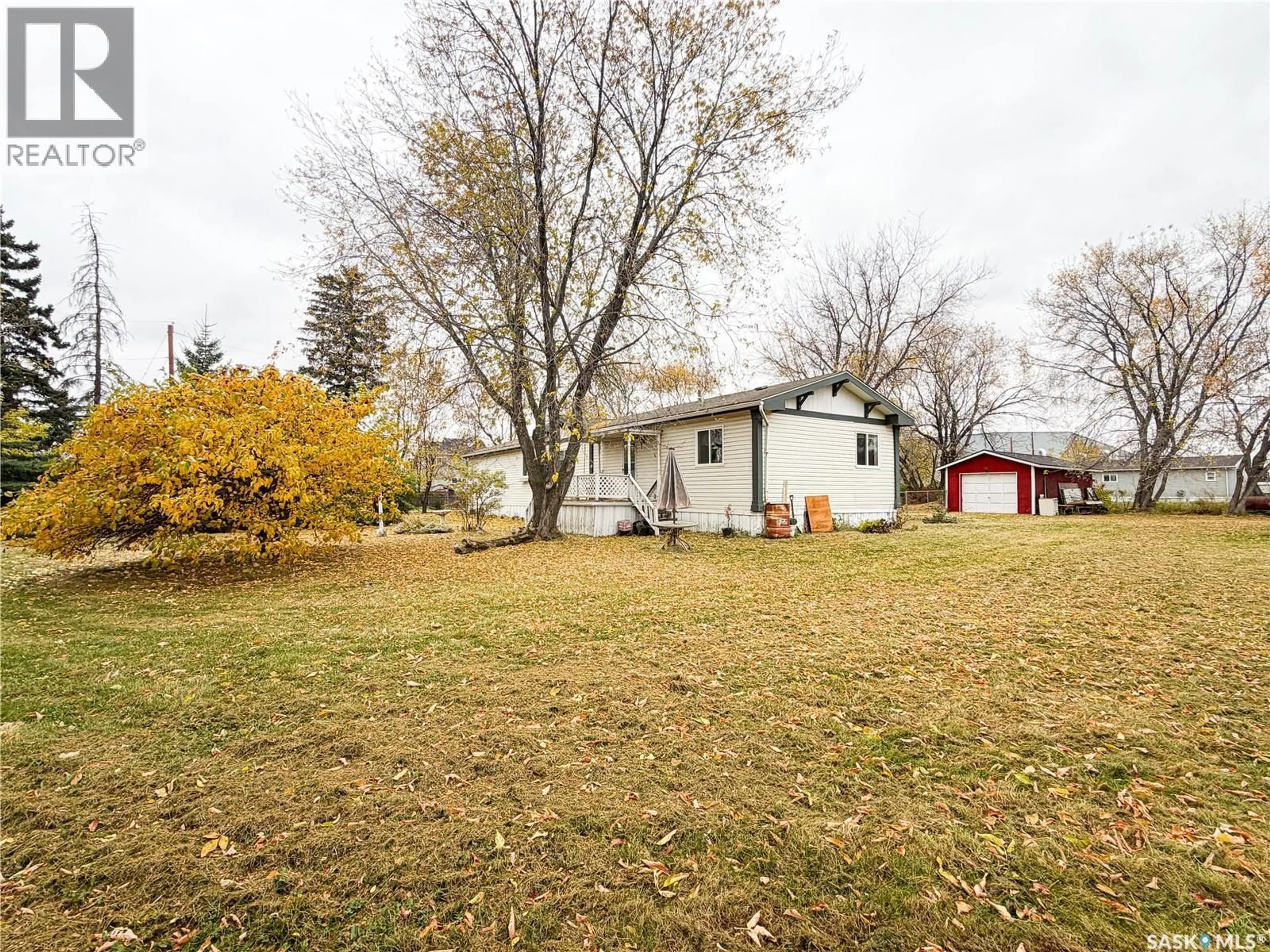 A pic from outside/outdoor area/front of a property/back of a property/a pic from drone, street for E - 501 7TH AVENUE, Meadow Lake Saskatchewan S9X1X9