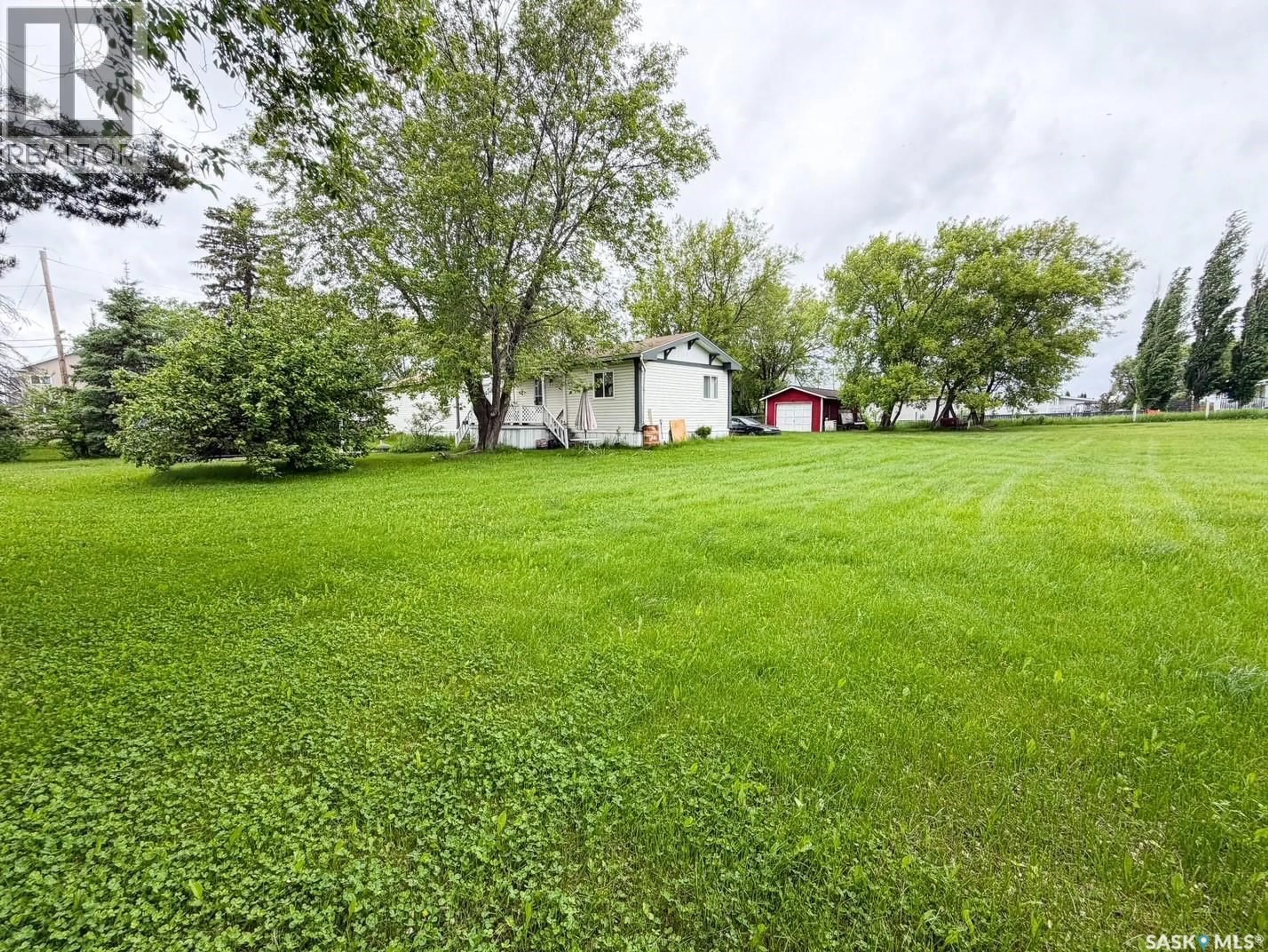 A pic from outside/outdoor area/front of a property/back of a property/a pic from drone, unknown for E - 501 7TH AVENUE, Meadow Lake Saskatchewan S9X1X9
