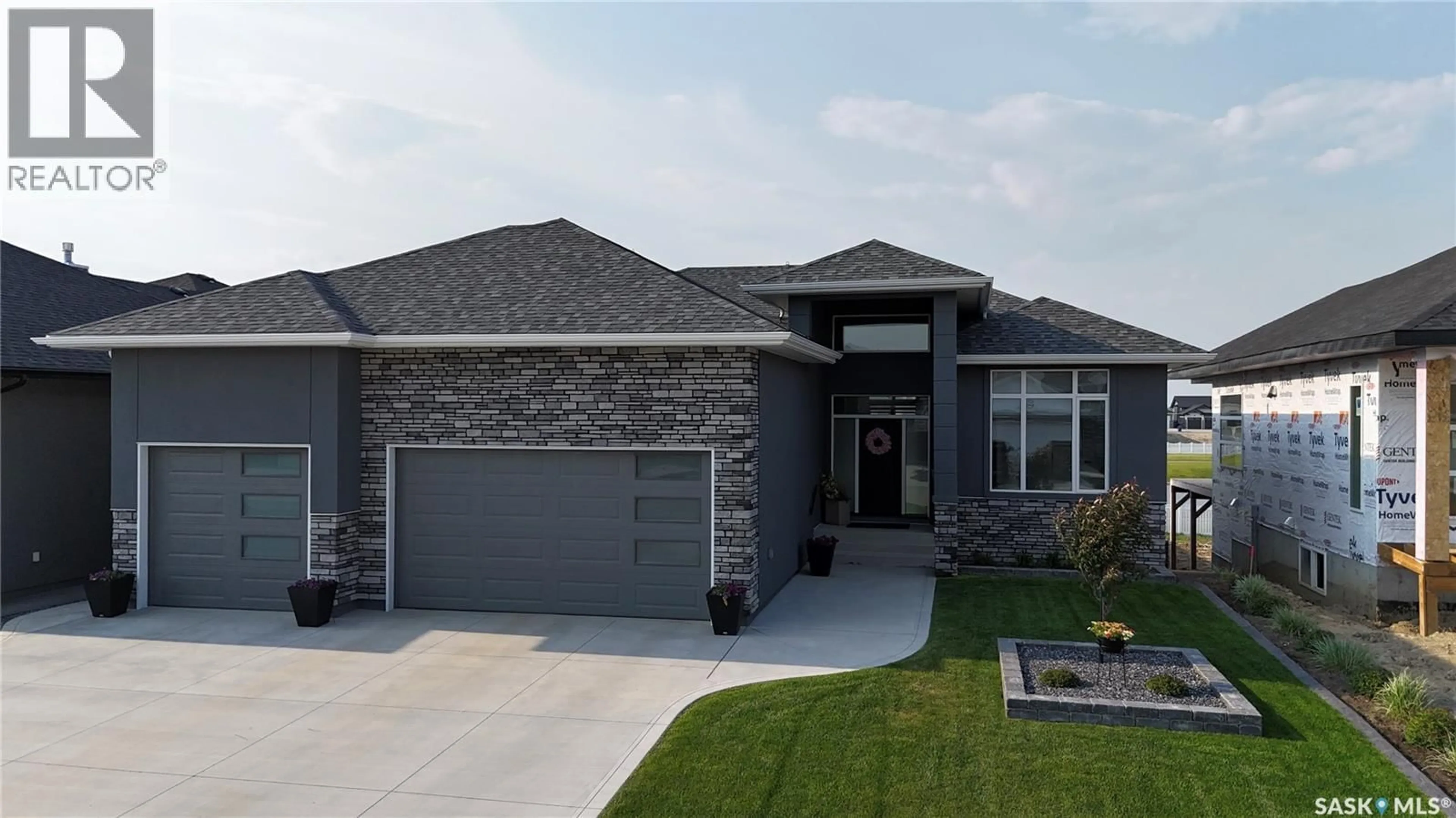 Home with brick exterior material, street for 222 ALBRIGHT CRESCENT, Warman Saskatchewan S0K4S0