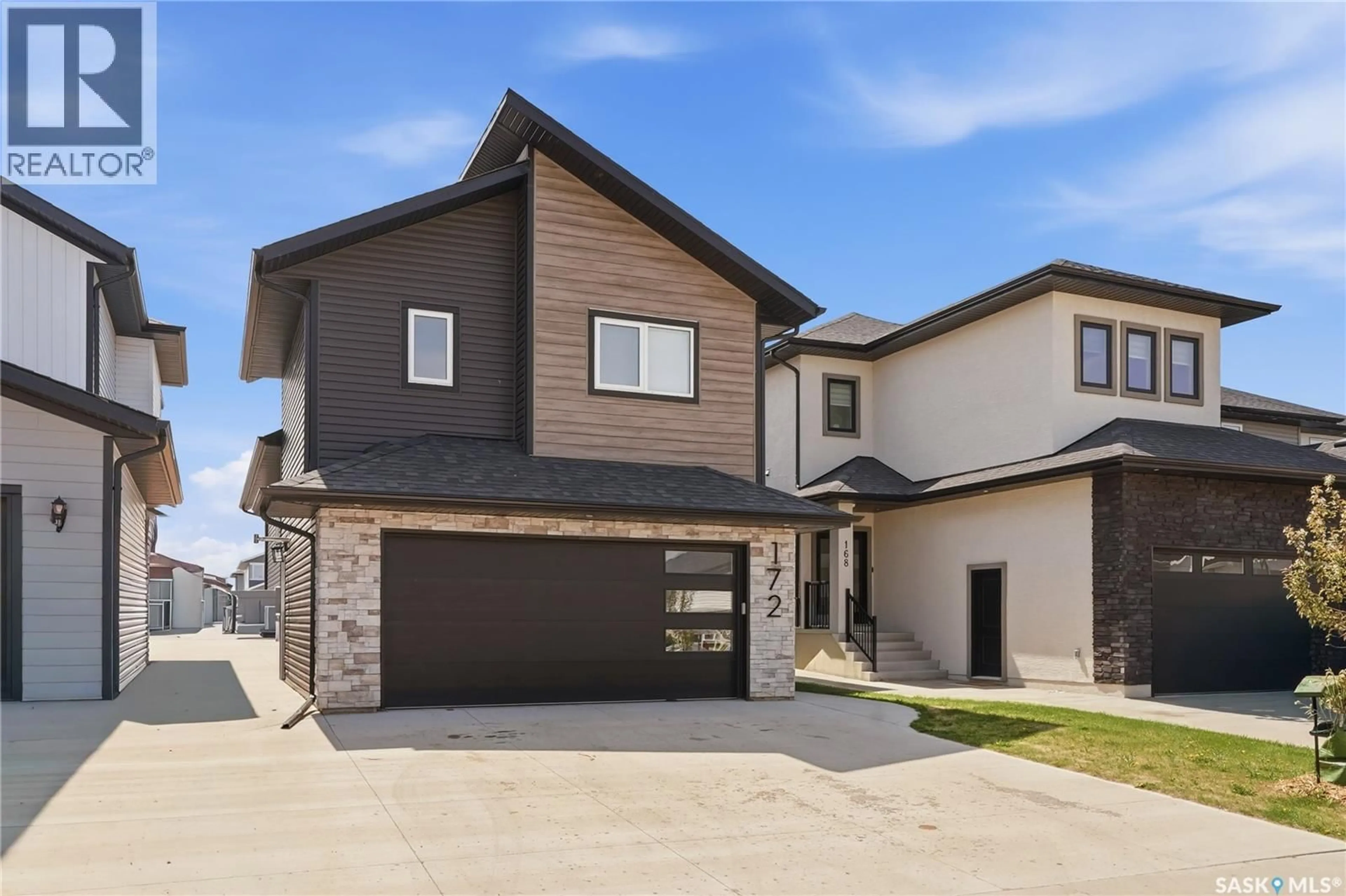 Home with brick exterior material, street for 172 THAKUR STREET, Saskatoon Saskatchewan S7W1C4