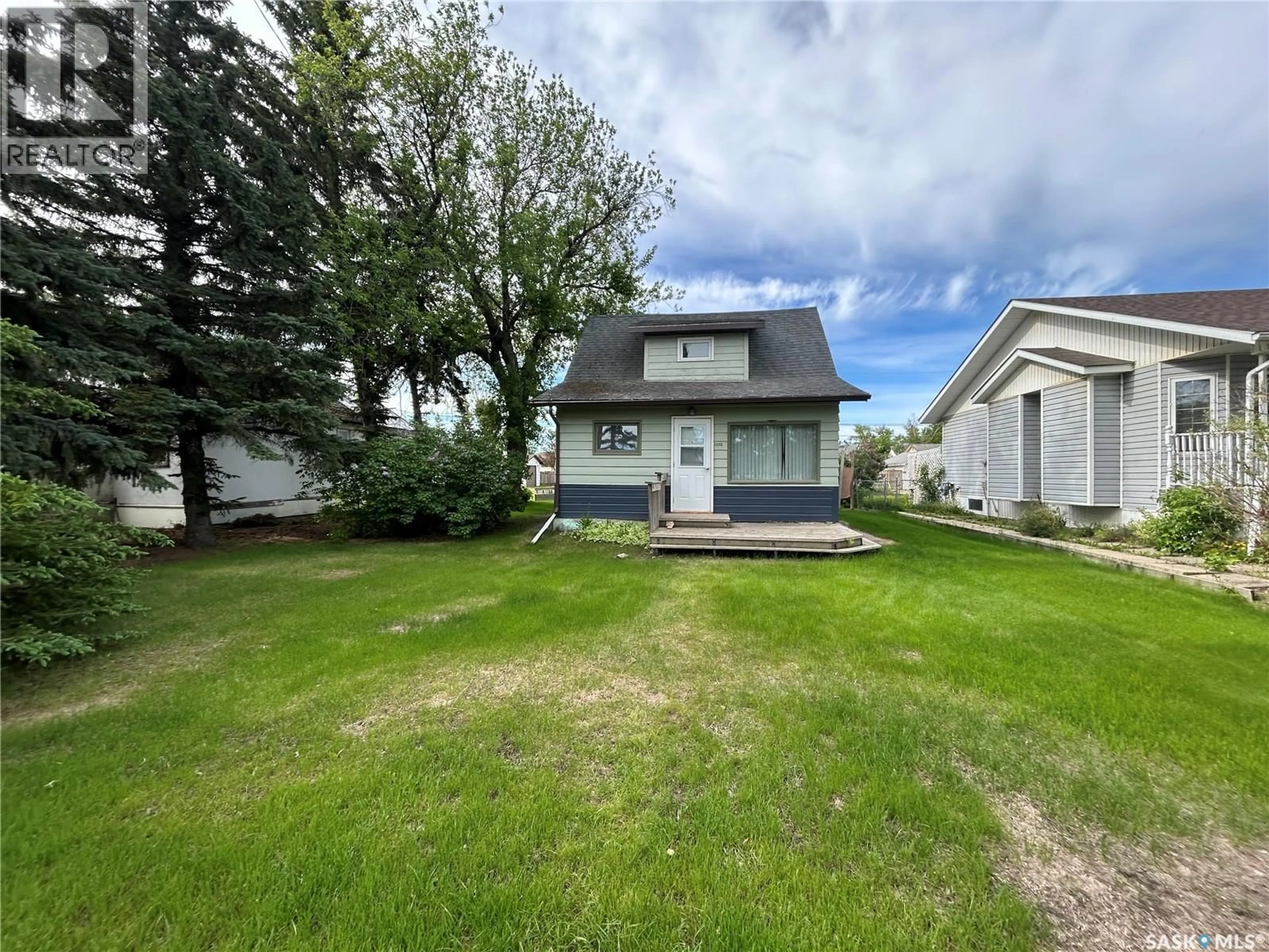 A pic from outside/outdoor area/front of a property/back of a property/a pic from drone, street for 1010 96TH AVENUE, Tisdale Saskatchewan S0E1T0