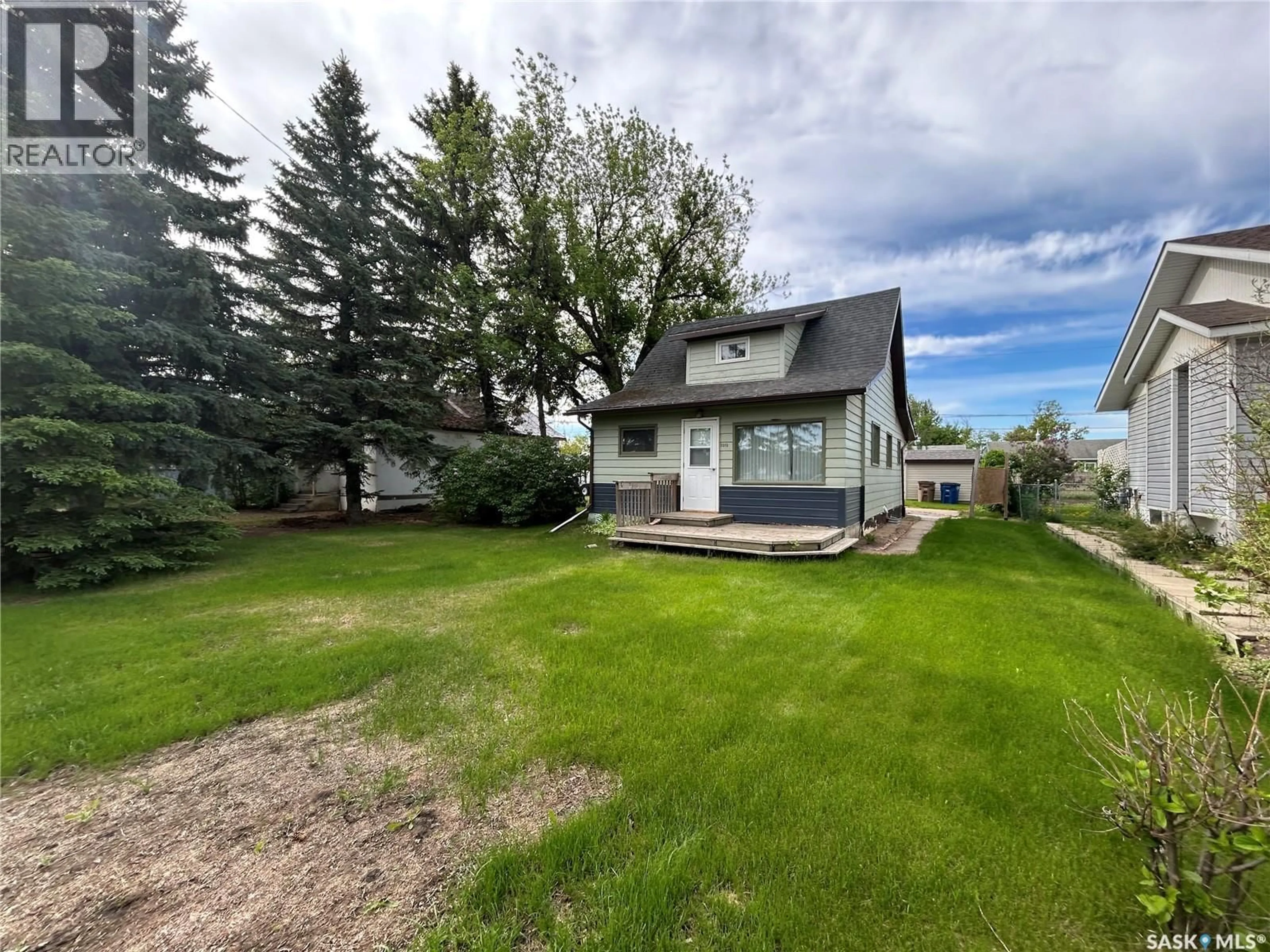 A pic from outside/outdoor area/front of a property/back of a property/a pic from drone, water/lake/river/ocean view for 1010 96TH AVENUE, Tisdale Saskatchewan S0E1T0