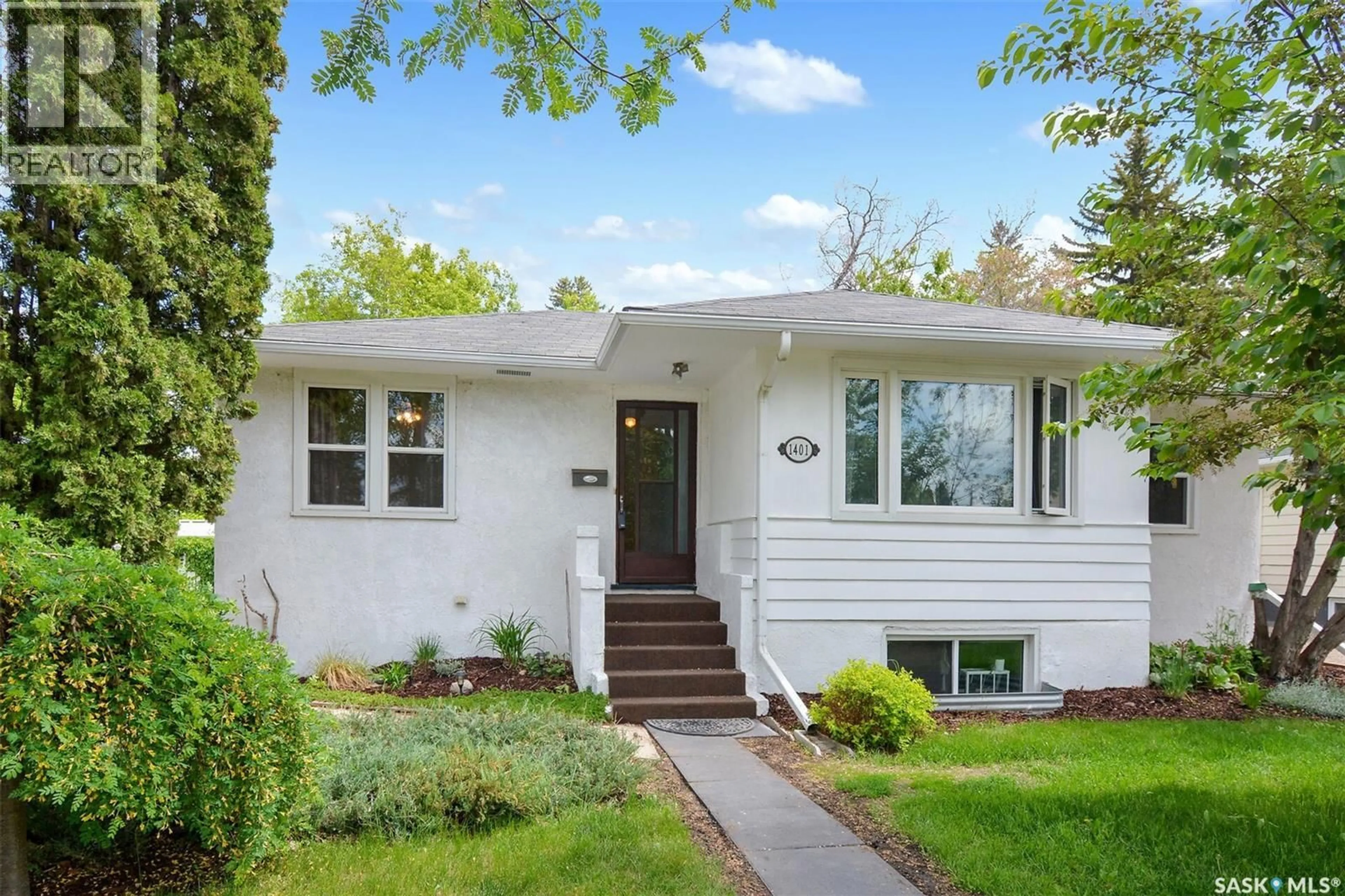 Home with vinyl exterior material, street for S - 1401 CUMBERLAND AVENUE, Saskatoon Saskatchewan S7H2L9