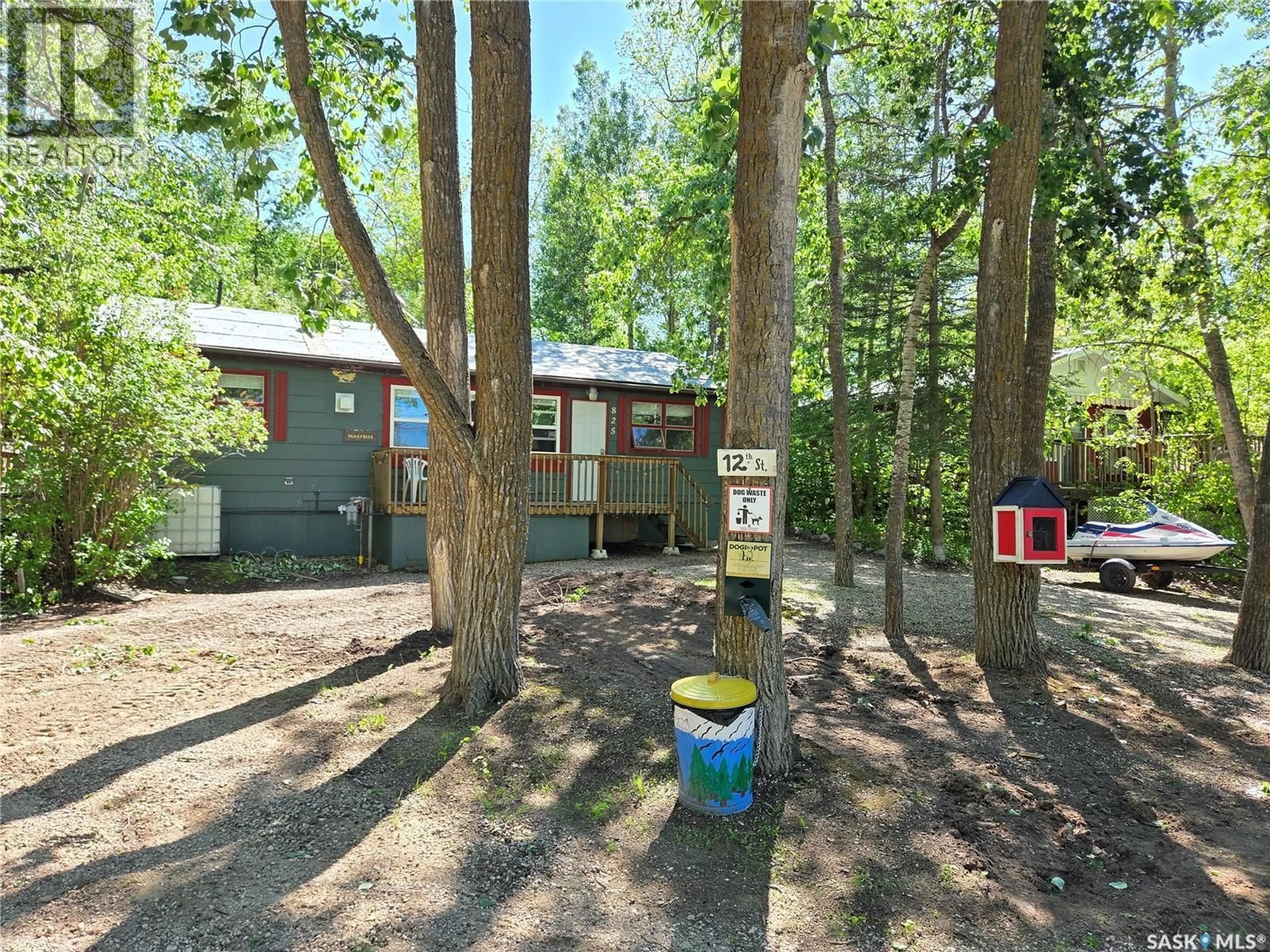 A pic from outside/outdoor area/front of a property/back of a property/a pic from drone, forest/trees view for 825 LAKESIDE AVENUE, White Bear IR 70 Saskatchewan S0C0R0