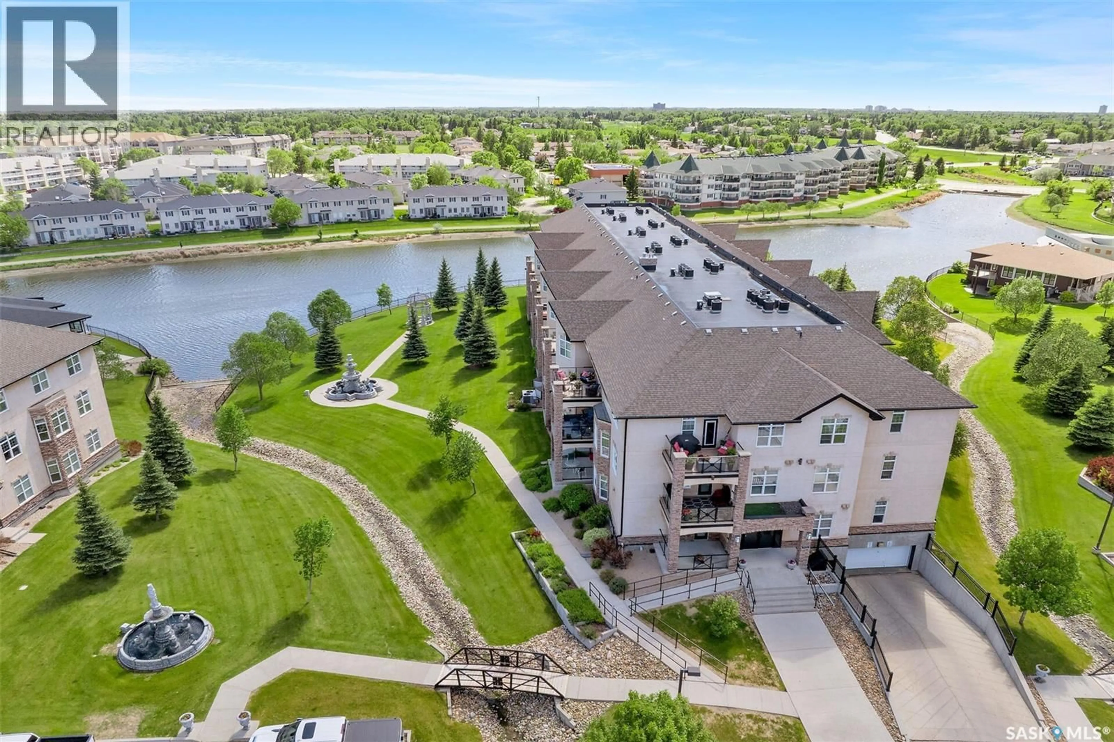 A pic from outside/outdoor area/front of a property/back of a property/a pic from drone, water/lake/river/ocean view for 304 - 2150 HESELTINE ROAD, Regina Saskatchewan S4V1L1