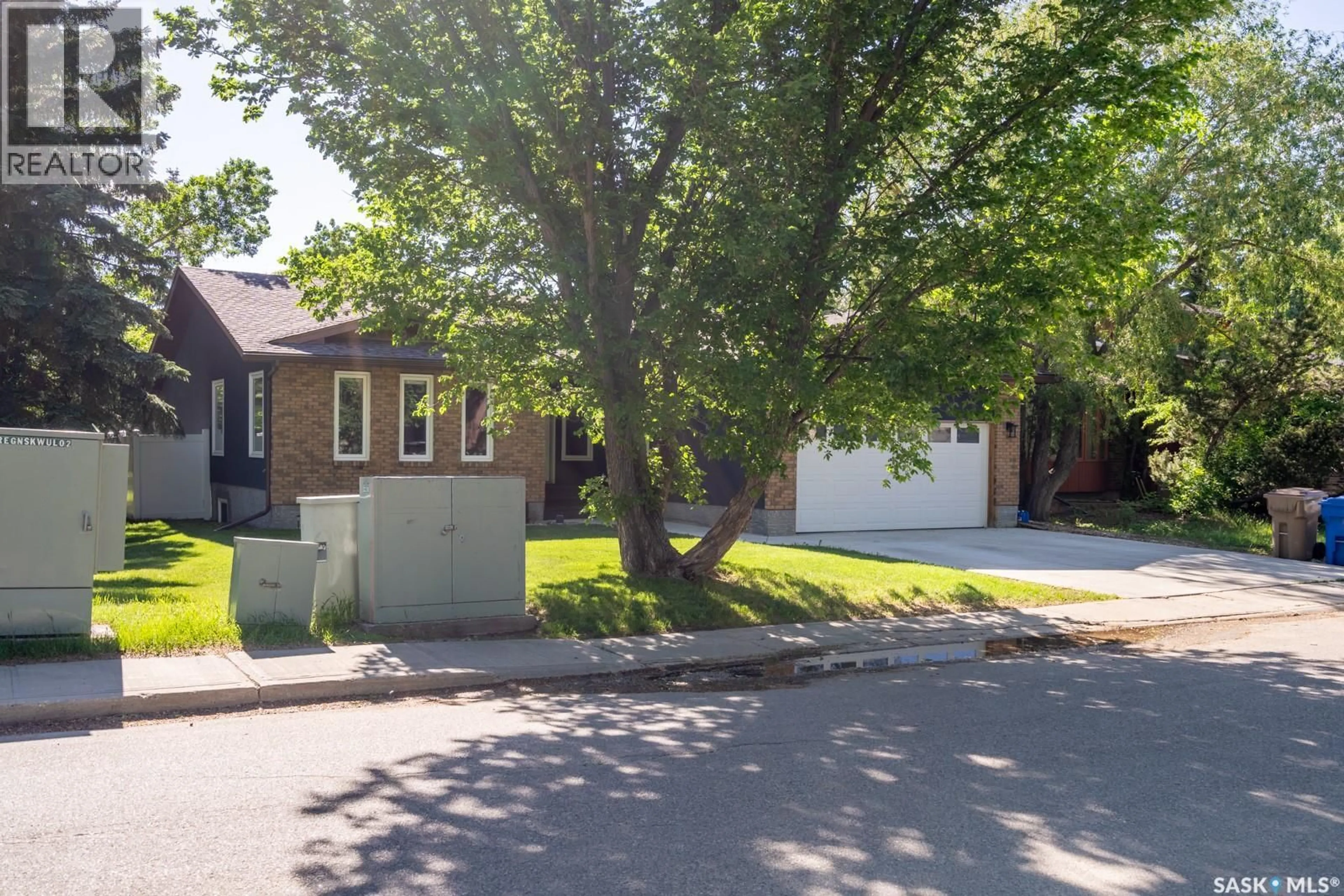 A pic from outside/outdoor area/front of a property/back of a property/a pic from drone, street for 1262 JAMES CRESCENT, Regina Saskatchewan S4M6A5