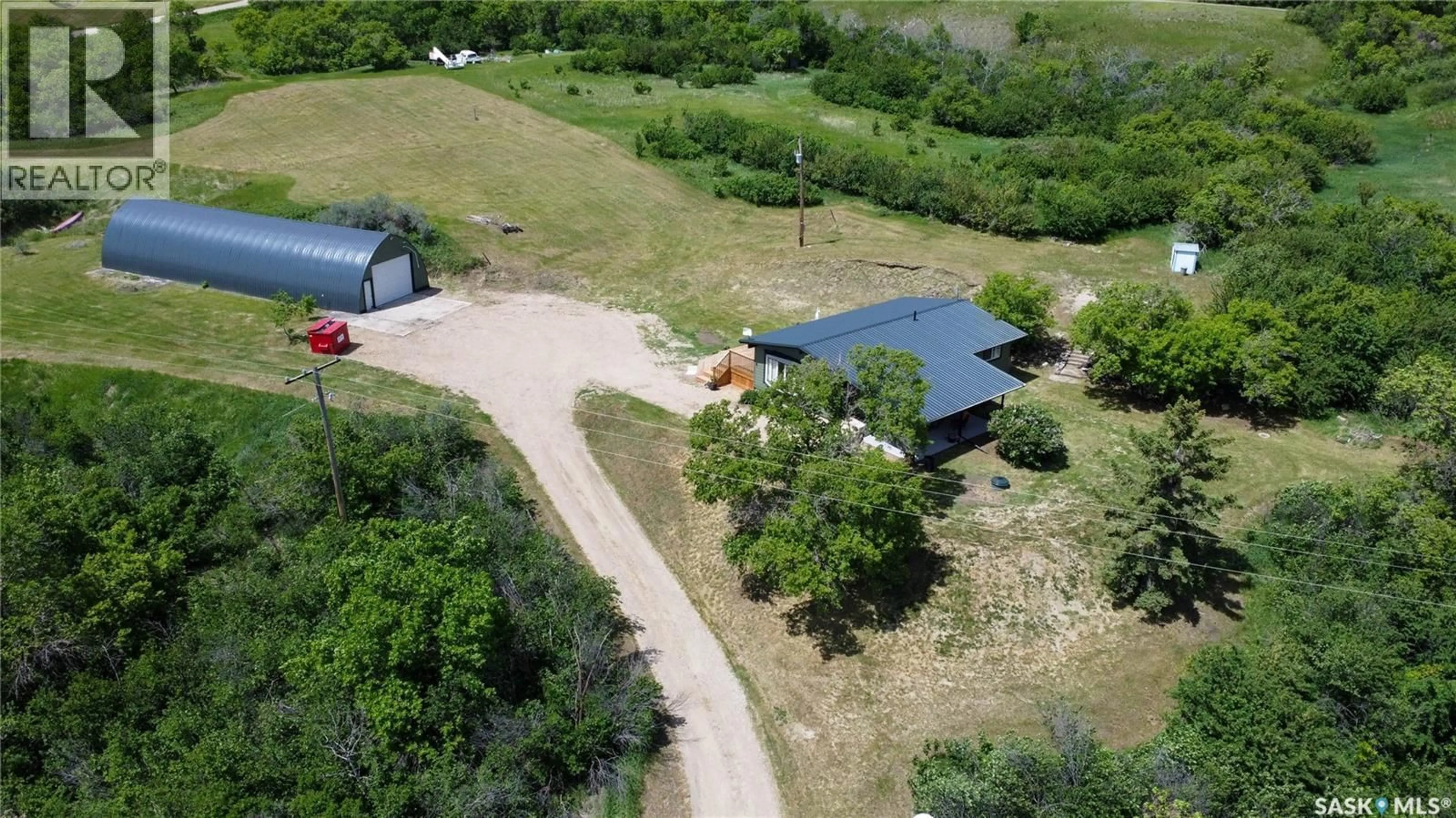 A pic from outside/outdoor area/front of a property/back of a property/a pic from drone, unknown for MARTENS ACREAGE, Lumsden Rm No. 189 Saskatchewan S0G3C0
