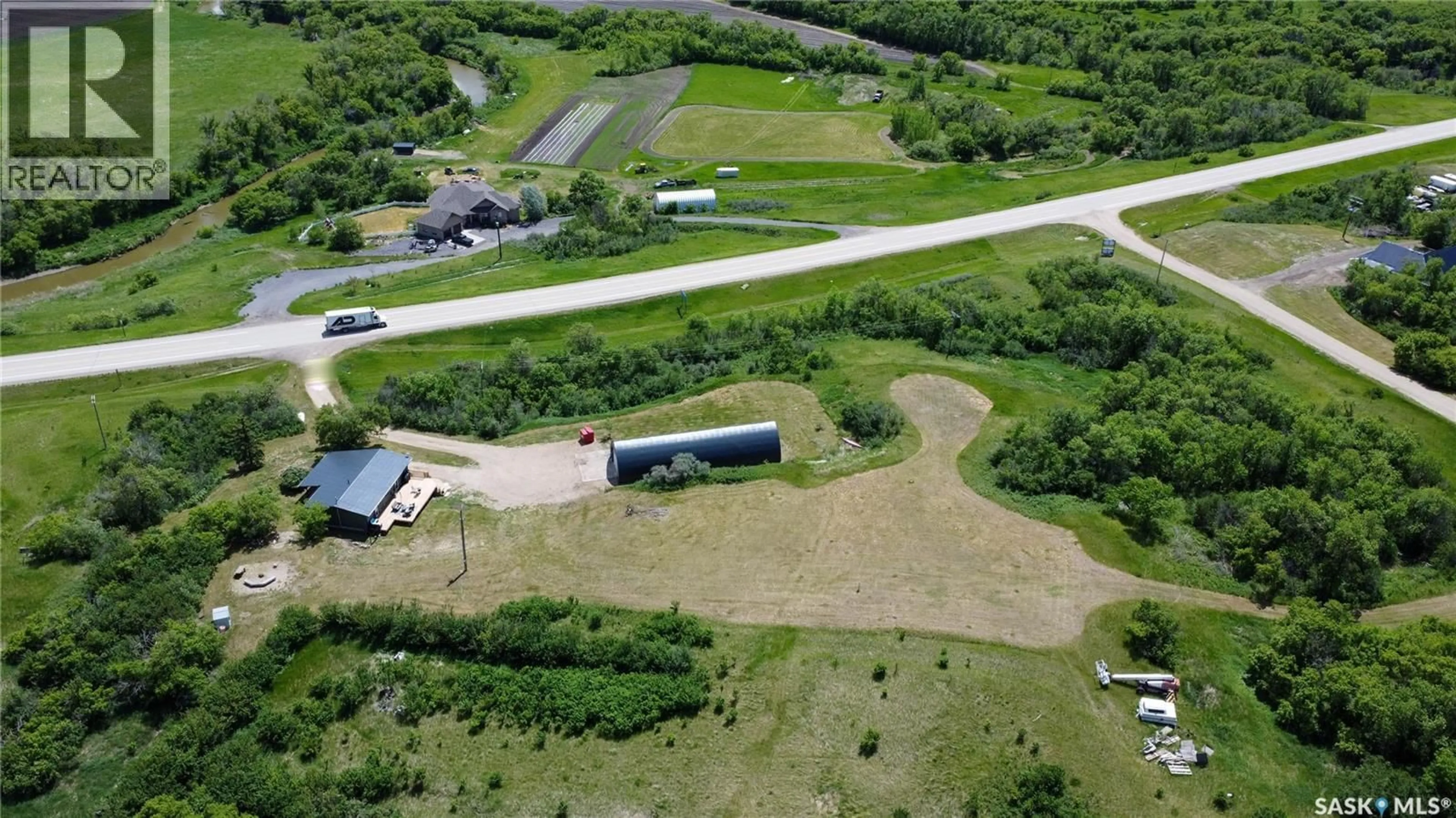 A pic from outside/outdoor area/front of a property/back of a property/a pic from drone, street for MARTENS ACREAGE, Lumsden Rm No. 189 Saskatchewan S0G3C0