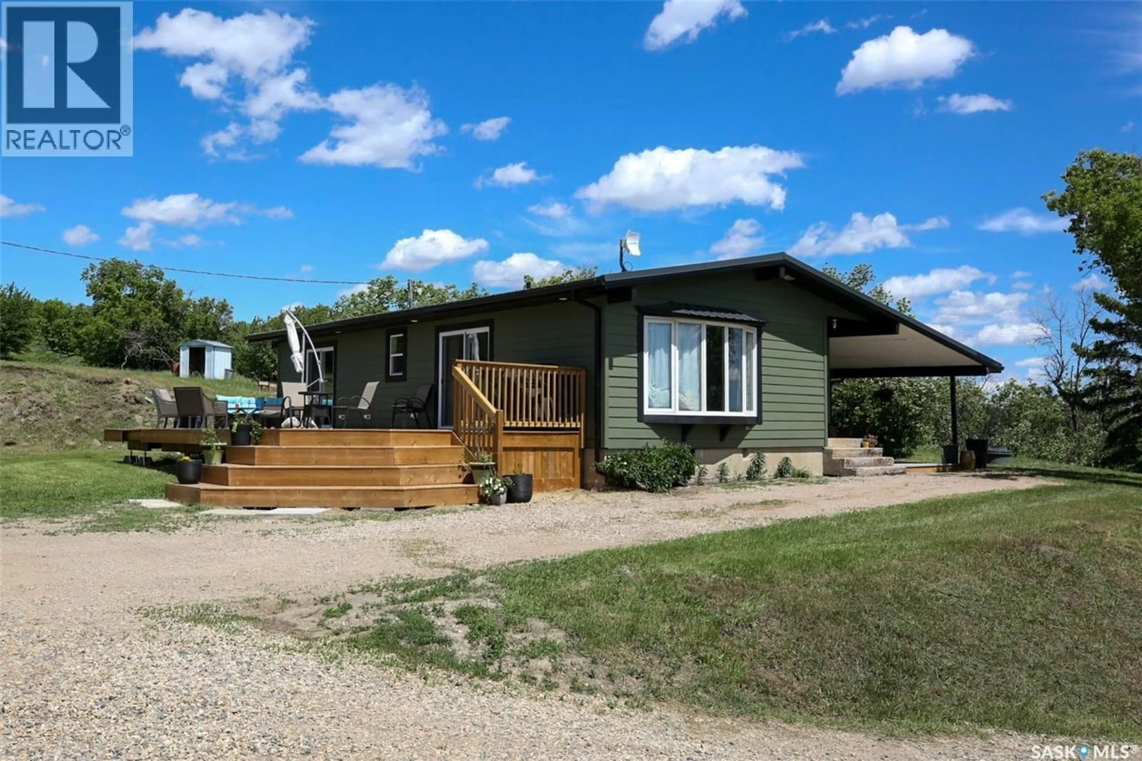 Home with vinyl exterior material, street for MARTENS ACREAGE, Lumsden Rm No. 189 Saskatchewan S0G3C0