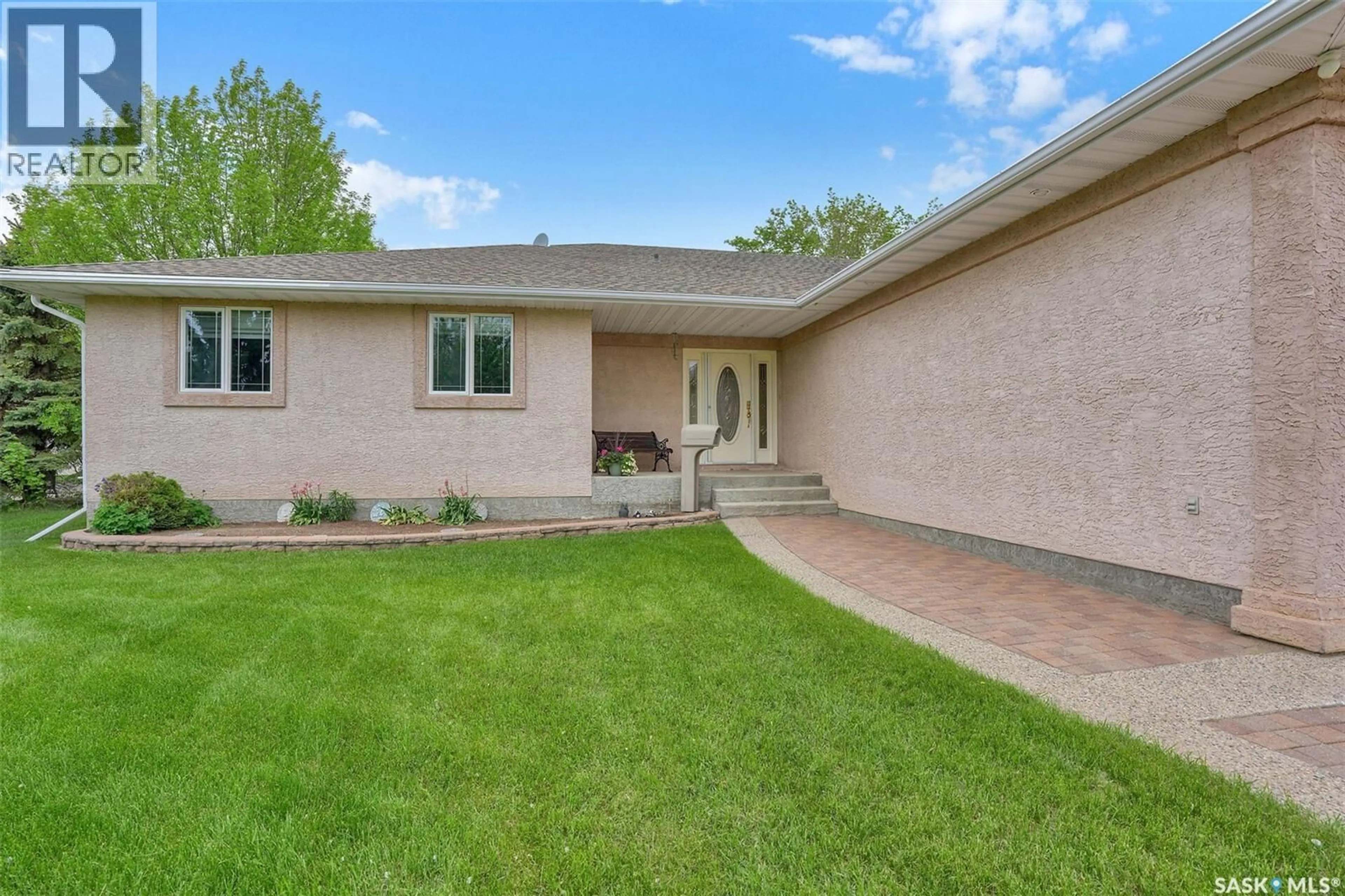 Home with brick exterior material, street for 33 LOTT ROAD, White City Saskatchewan S4L5B1