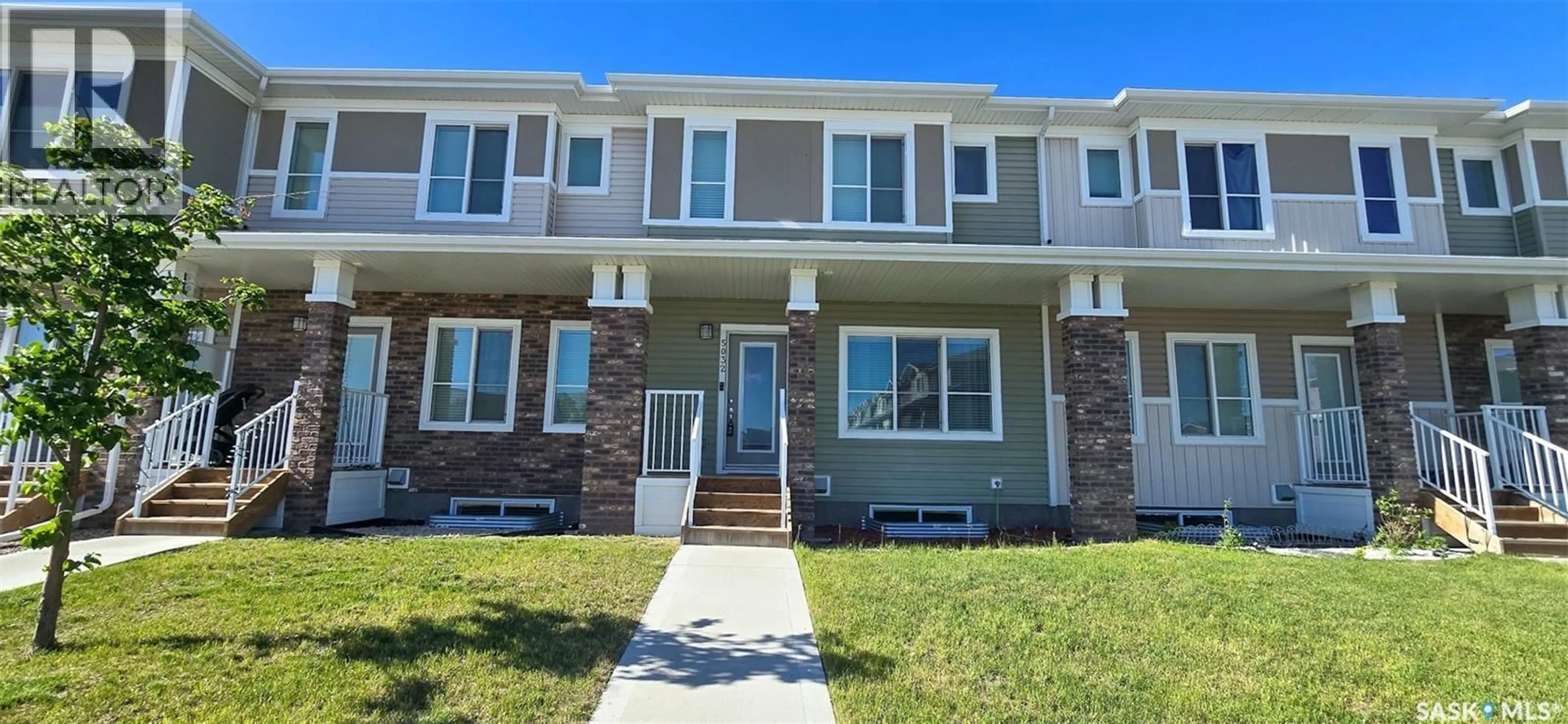 Home with vinyl exterior material, street for E - 5032 PRIMROSE GREEN DRIVE, Regina Saskatchewan S4V3S5