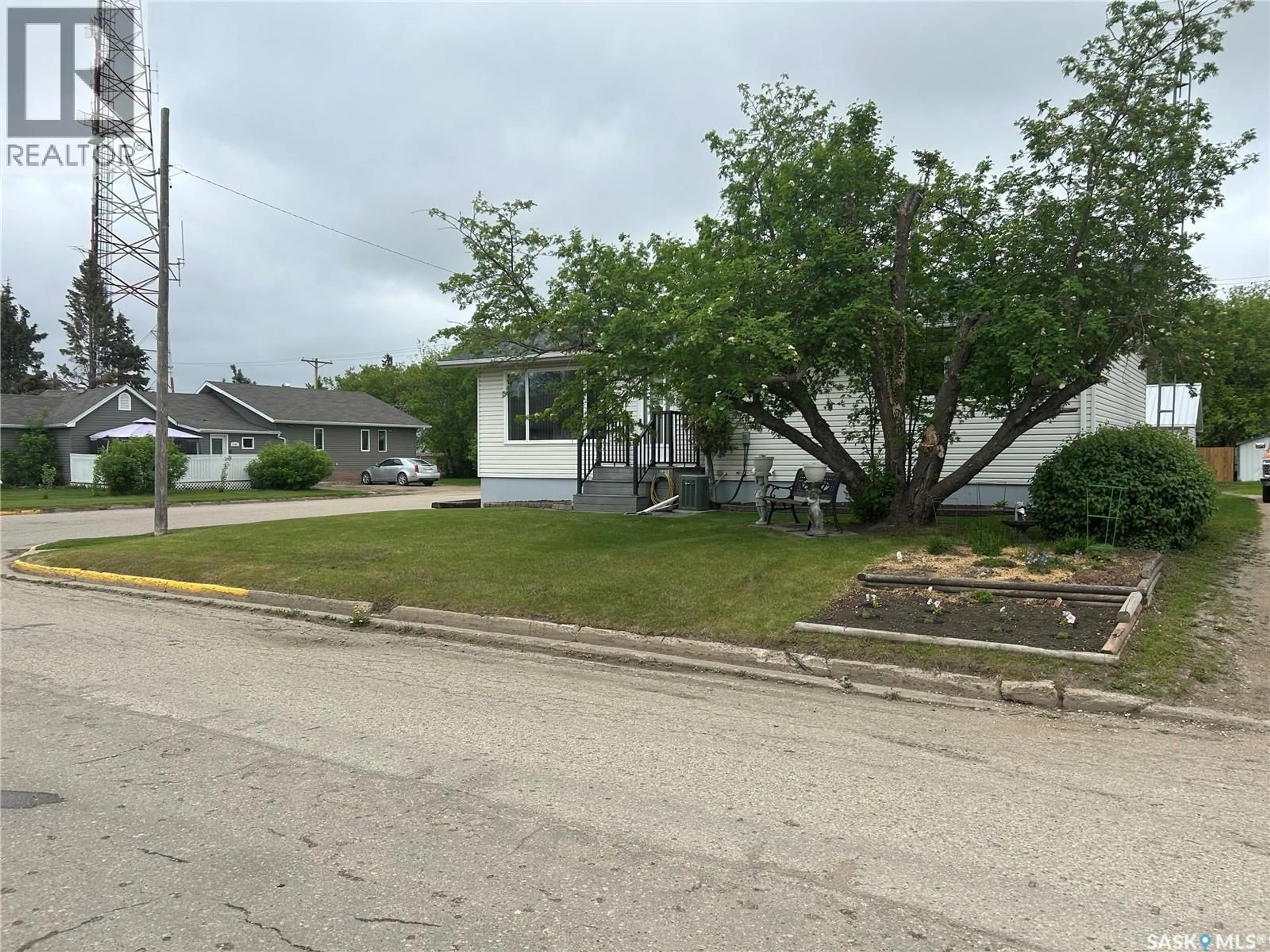 A pic from outside/outdoor area/front of a property/back of a property/a pic from drone, street for 202 2ND STREET, Carrot River Saskatchewan S0E0L0