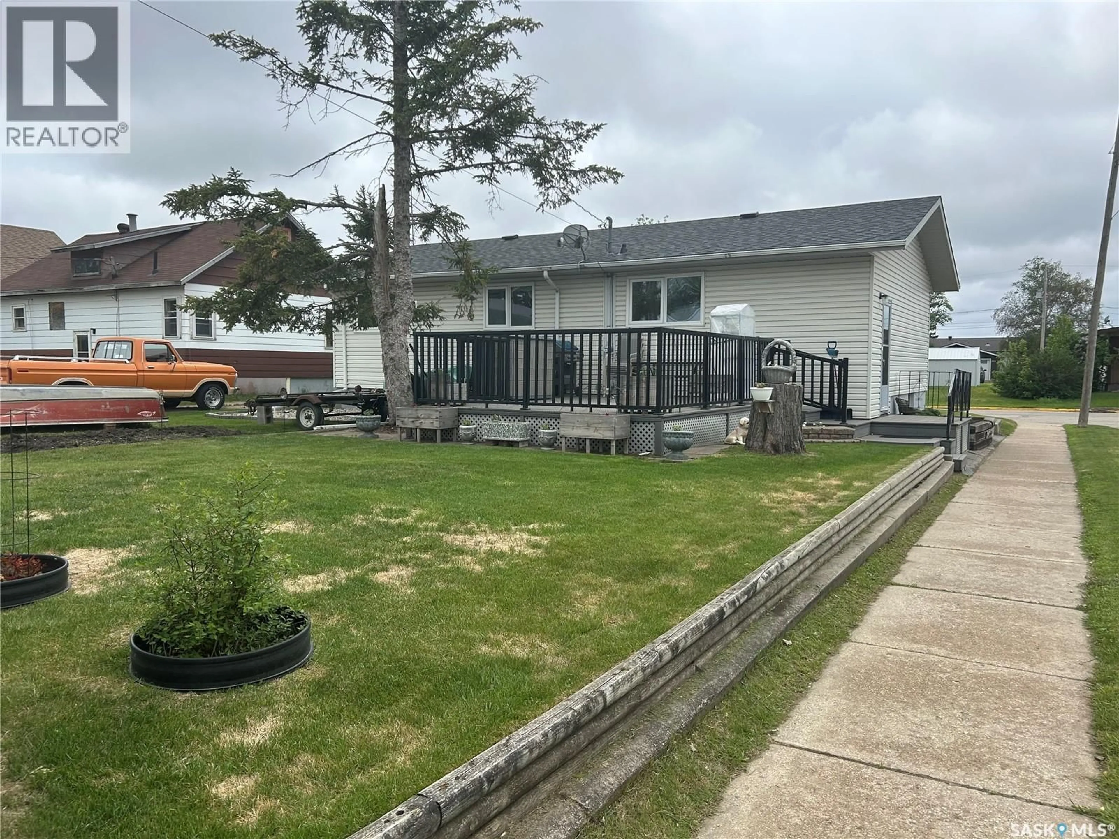 A pic from outside/outdoor area/front of a property/back of a property/a pic from drone, street for 202 2ND STREET, Carrot River Saskatchewan S0E0L0