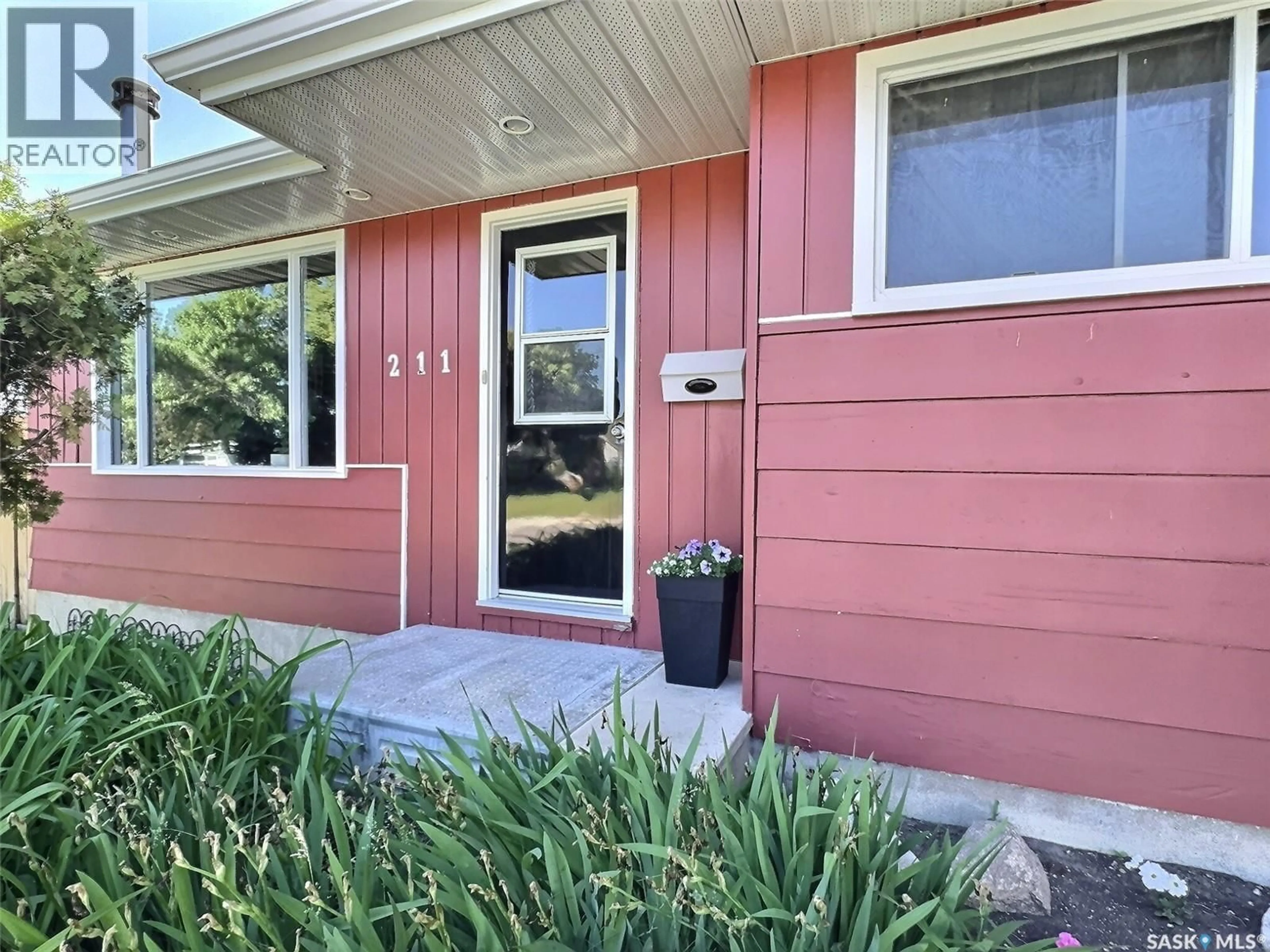 Home with vinyl exterior material, street for 211 DUNCAN ROAD, Estevan Saskatchewan S4A0A3
