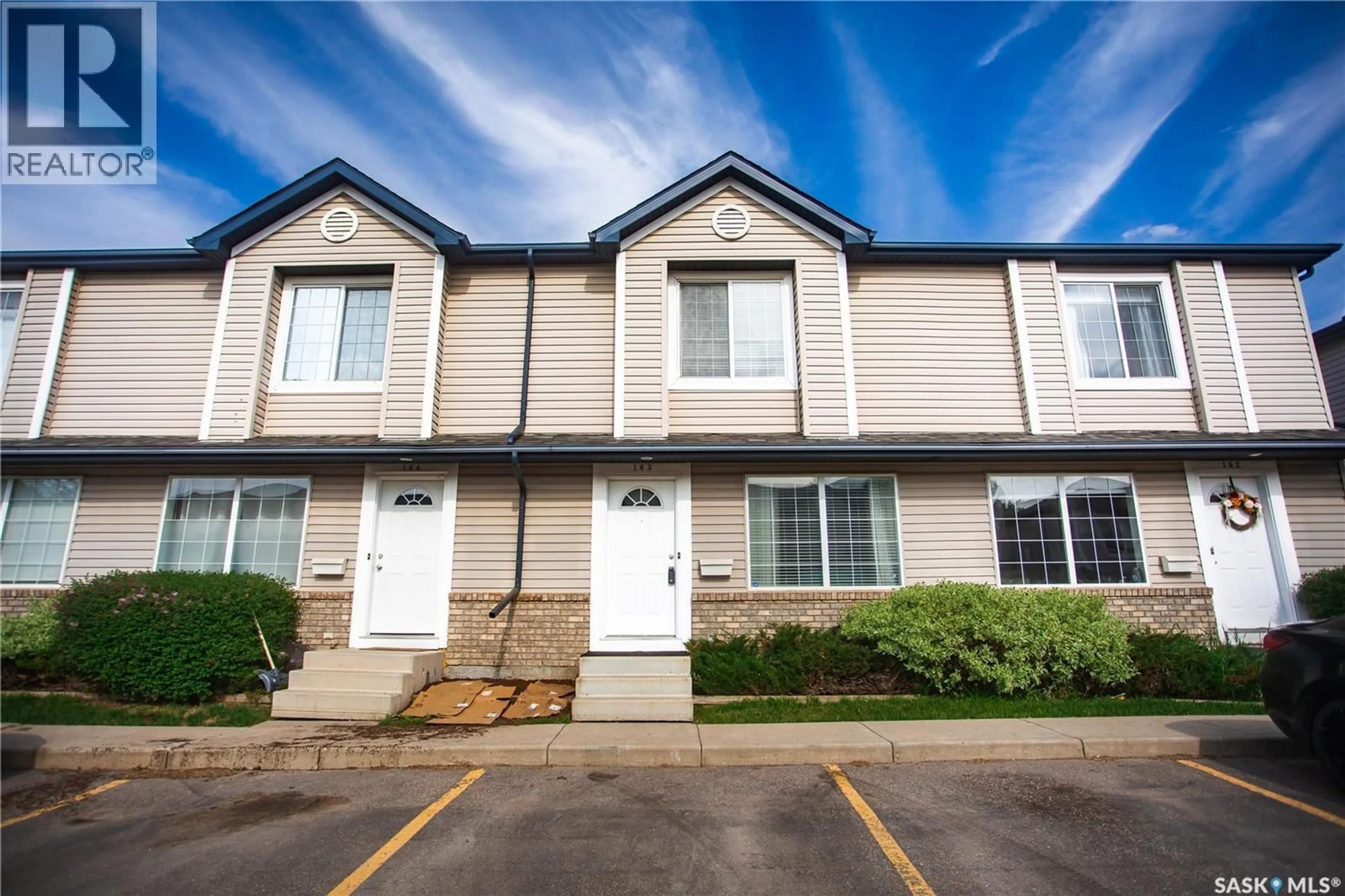 Home with vinyl exterior material, street for 670 - 163 KENDERDINE ROAD, Saskatoon Saskatchewan S7N4W5