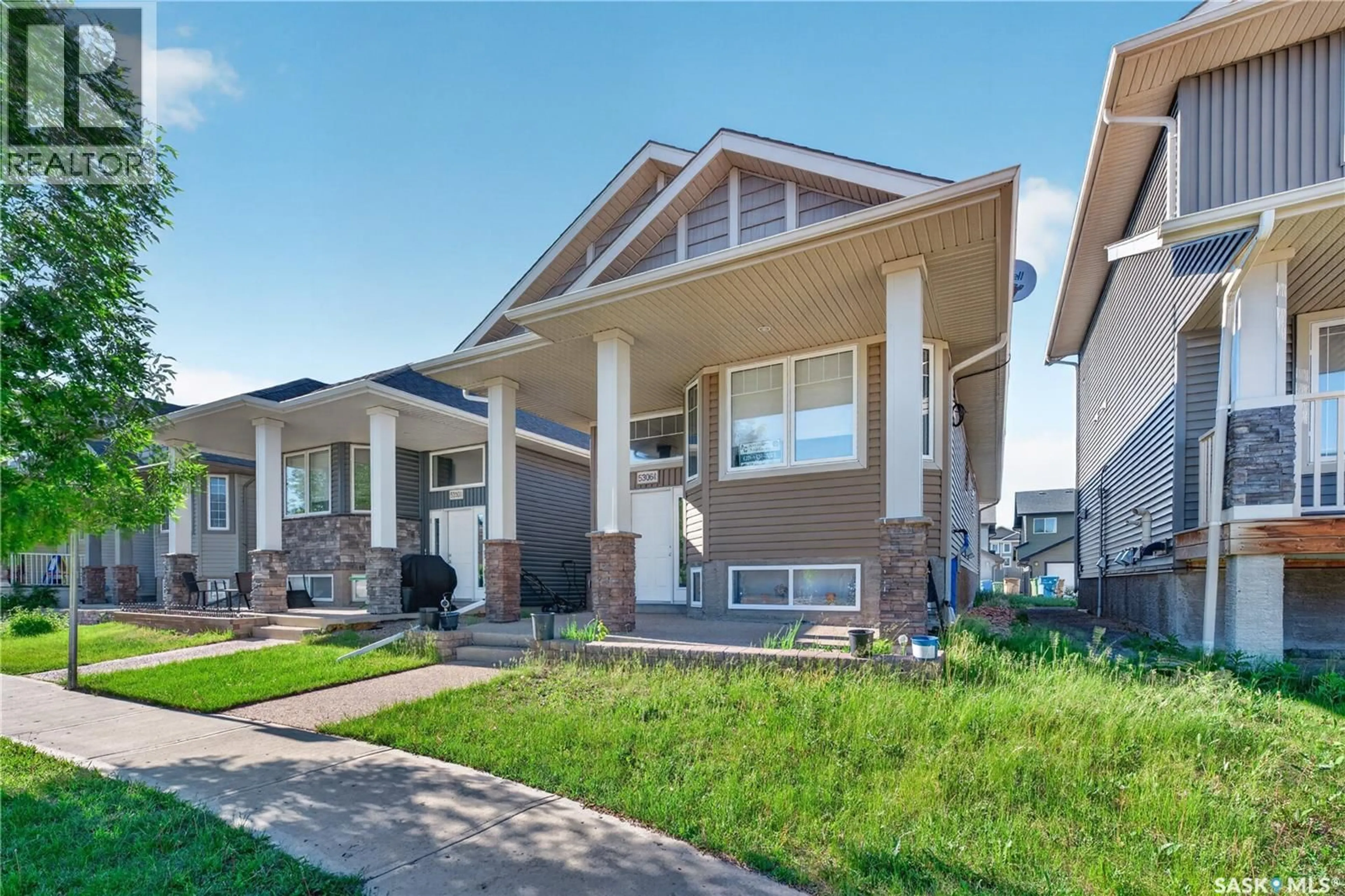 Home with vinyl exterior material, street for 5306 UNIVERSAL CRESCENT, Regina Saskatchewan S4W0K7