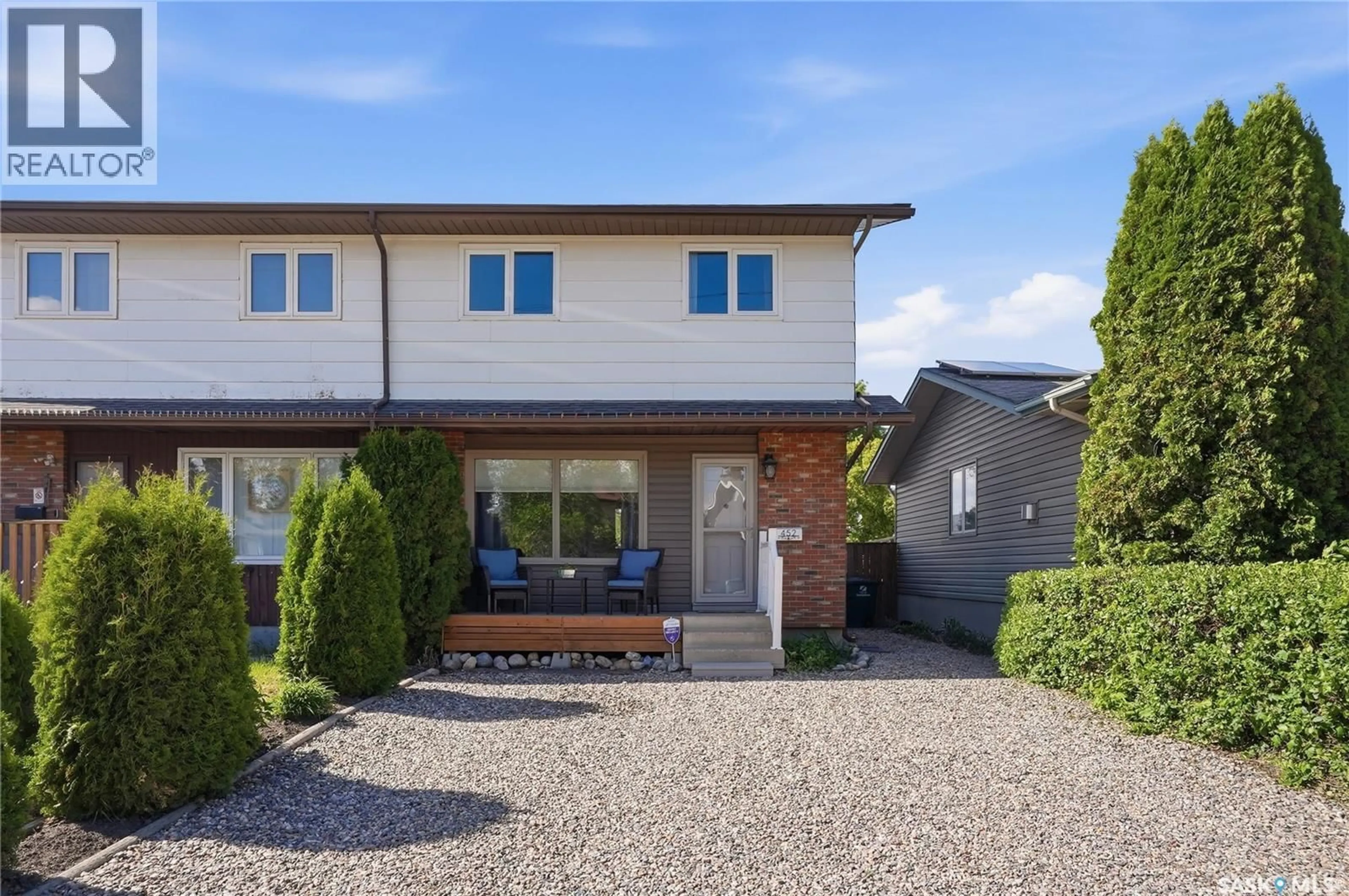 Home with brick exterior material, street for 452 LENORE DRIVE, Saskatoon Saskatchewan S7K5S7
