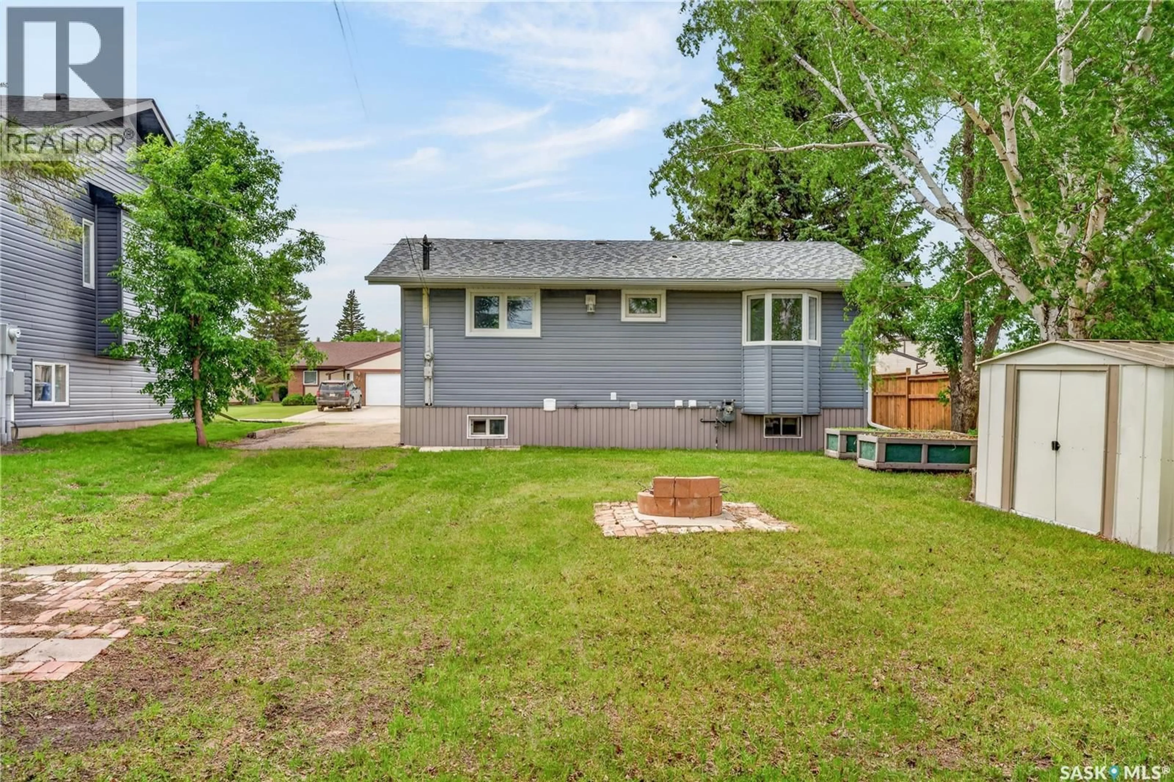 A pic from outside/outdoor area/front of a property/back of a property/a pic from drone, unknown for 716 3RD STREET, Humboldt Saskatchewan S0K2A0