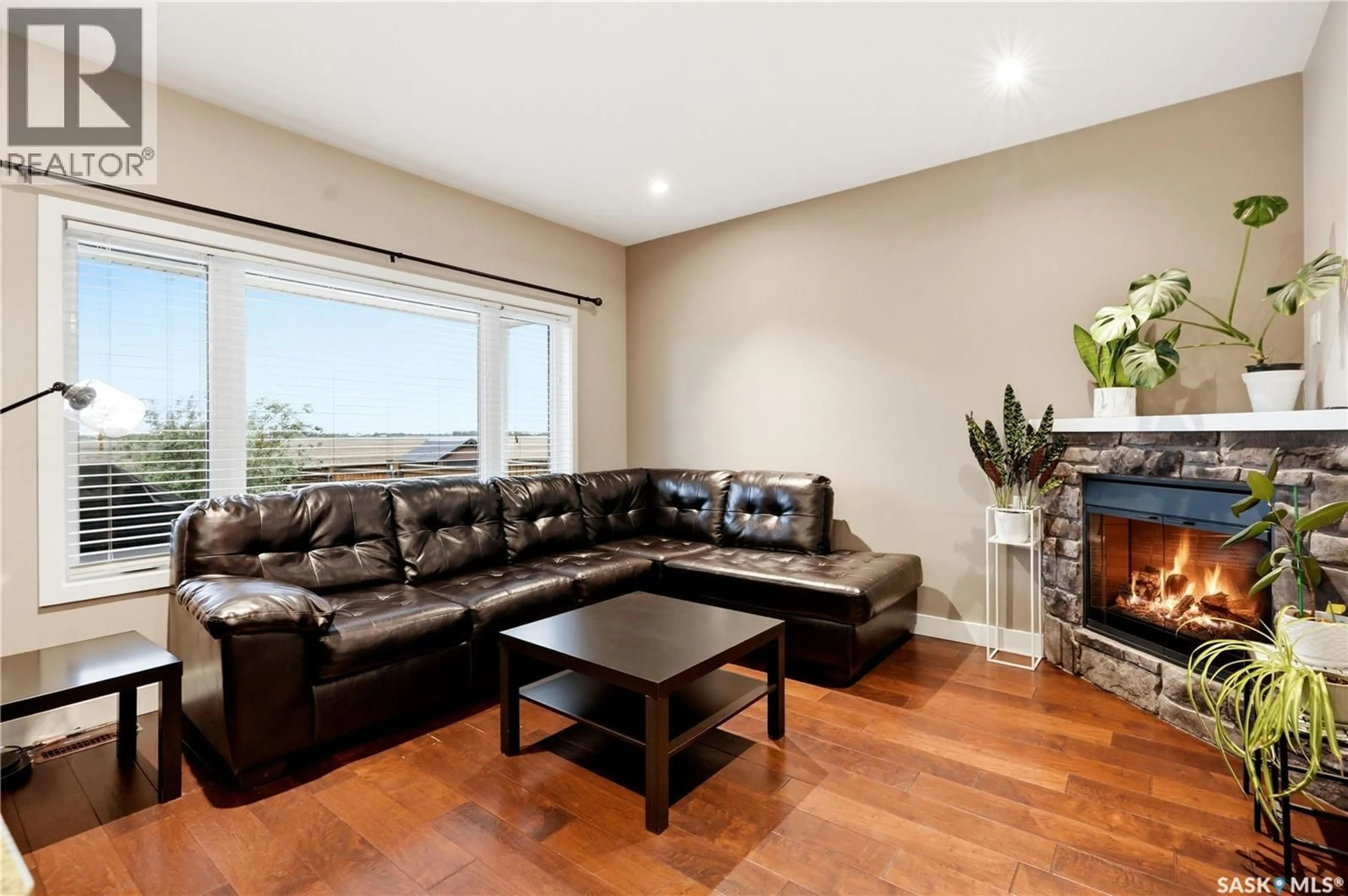 Living room with furniture, unknown for 433 REDWOOD CRESCENT, Warman Saskatchewan S0K0A1