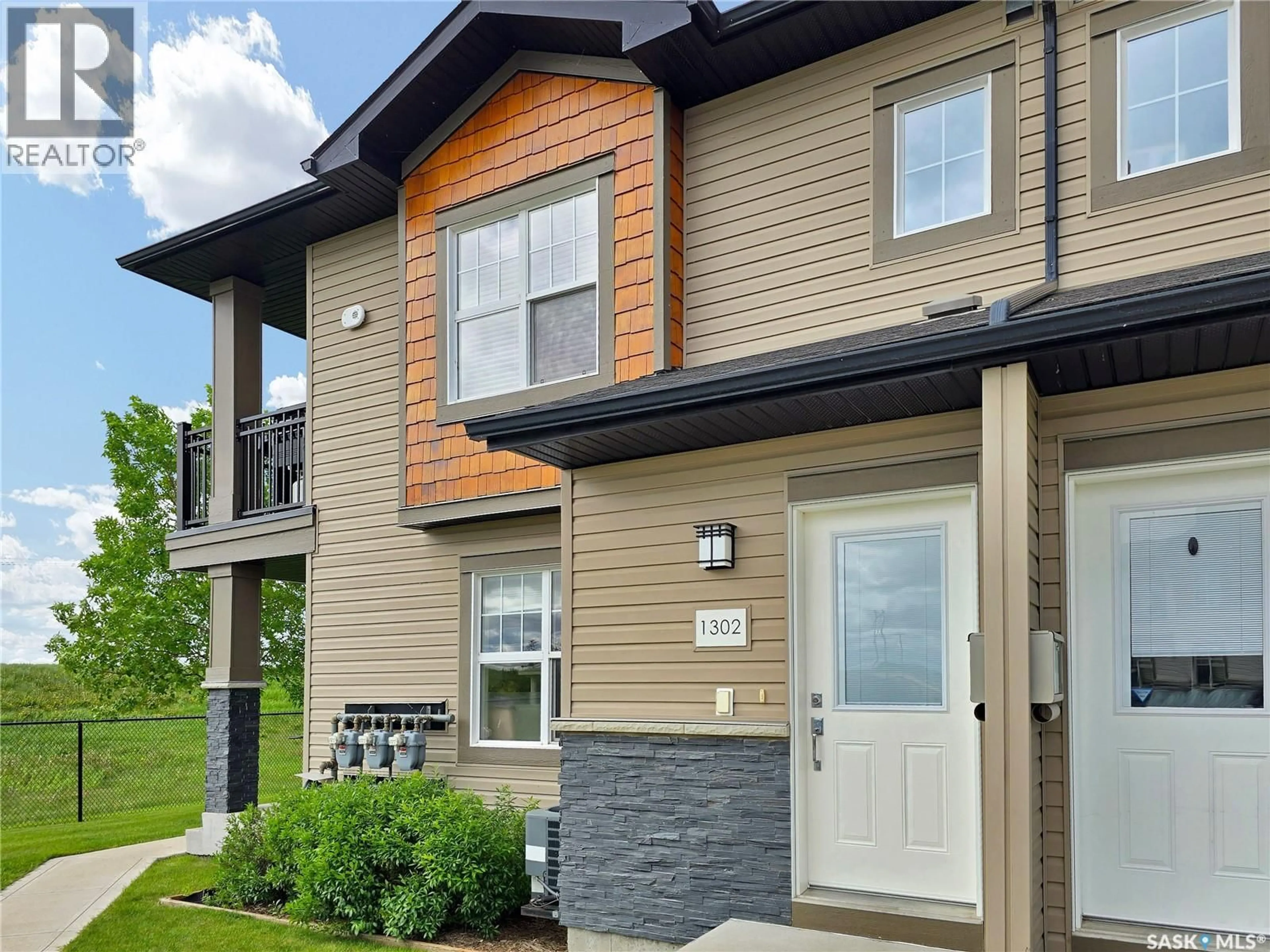 Home with vinyl exterior material, street for 1015 - 1302 PATRICK CRESCENT, Saskatoon Saskatchewan S7W0M5