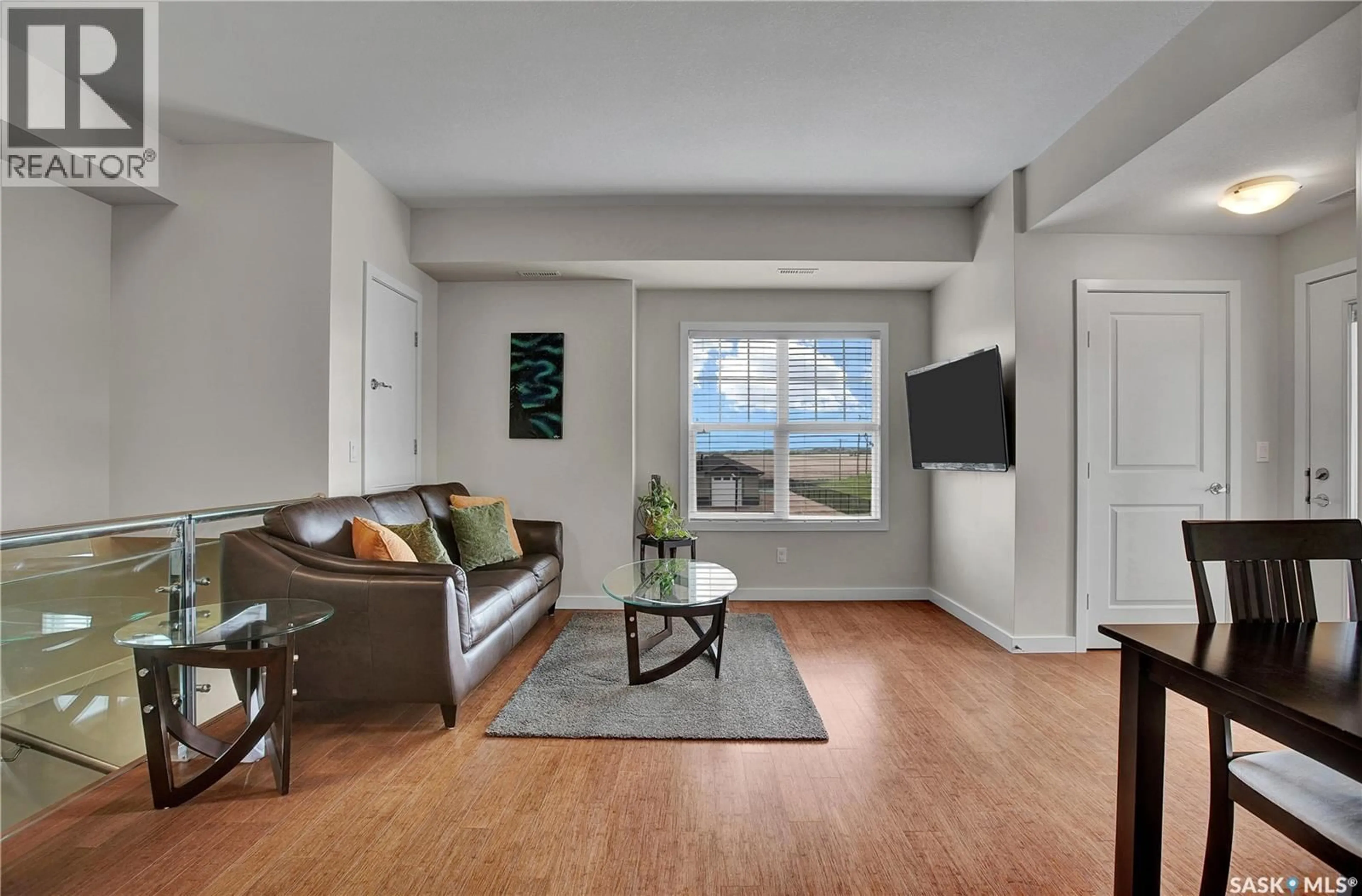 Living room with furniture, unknown for 1015 - 1302 PATRICK CRESCENT, Saskatoon Saskatchewan S7W0M5