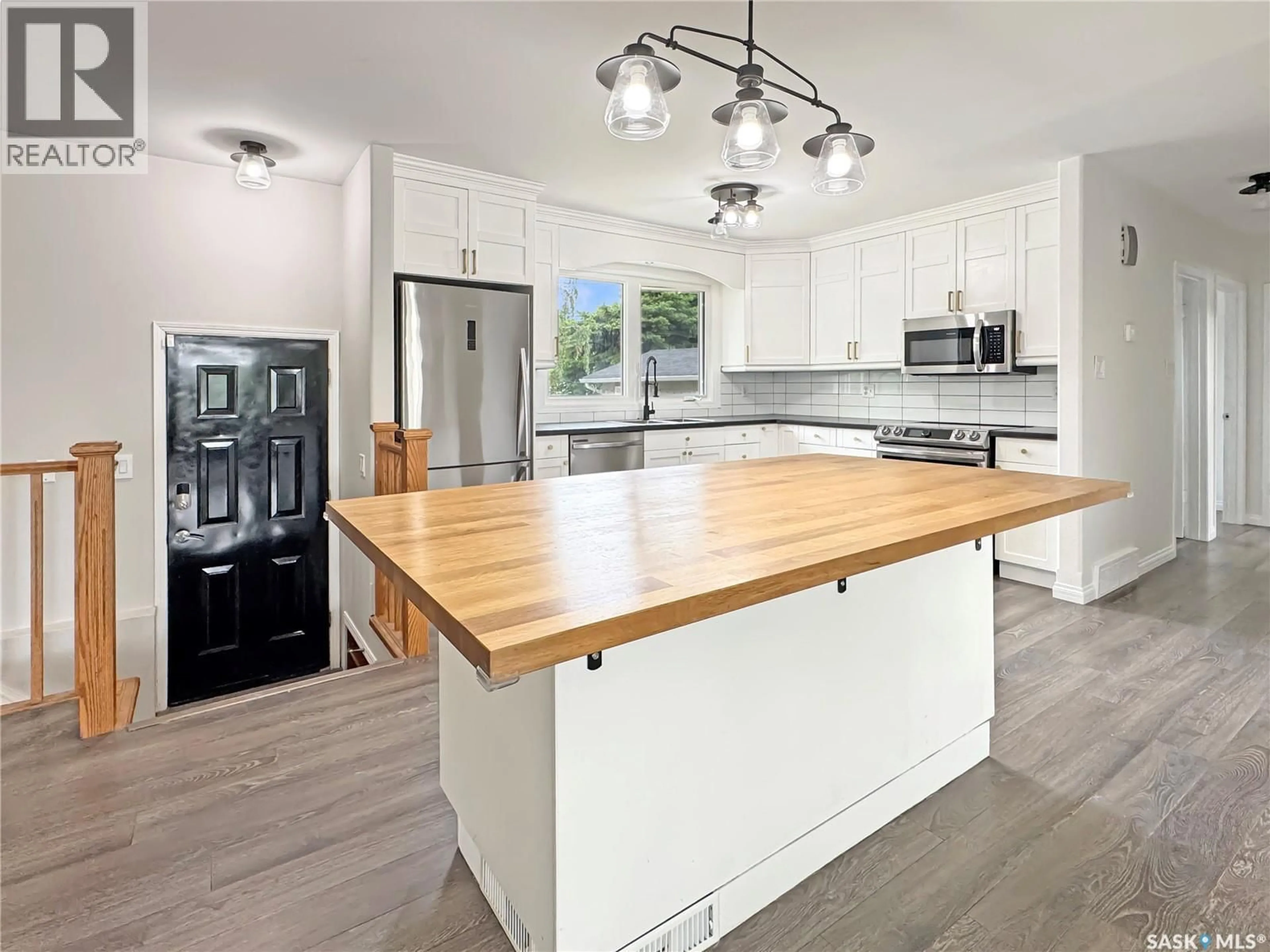 Open concept kitchen, unknown for 1661 91ST STREET, North Battleford Saskatchewan S9A0A3