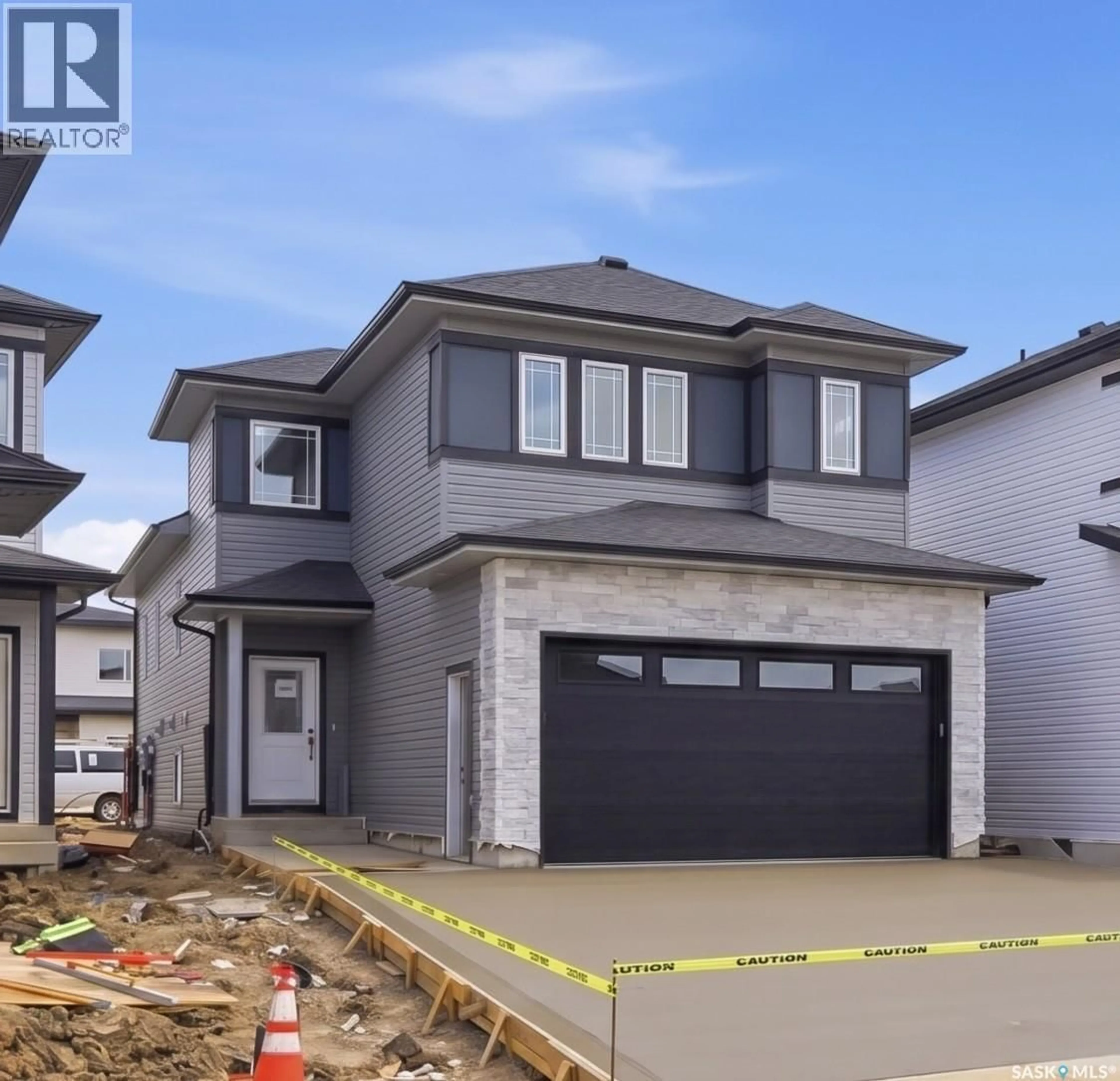 Home with vinyl exterior material, street for 1158 NIGHTINGALE TERRACE, Saskatoon Saskatchewan S7L7R5