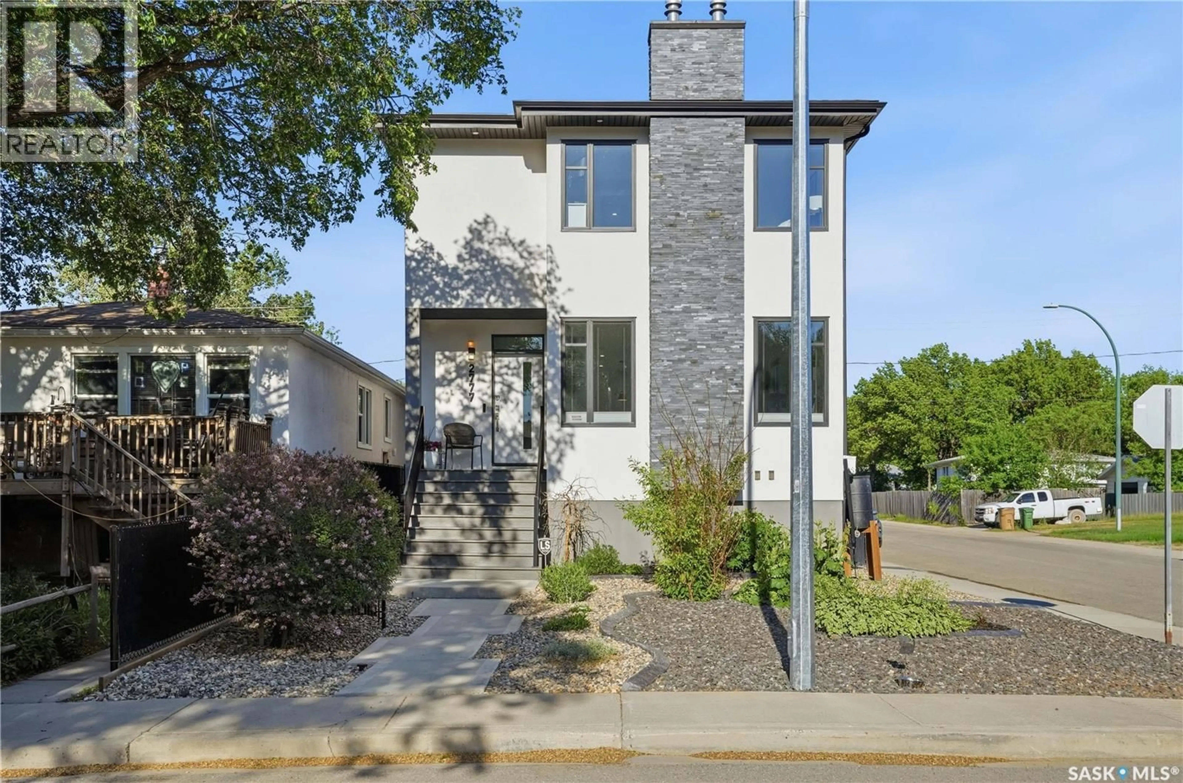 Home with brick exterior material, street for 2777 MCDONALD STREET, Regina Saskatchewan S4N2Z9