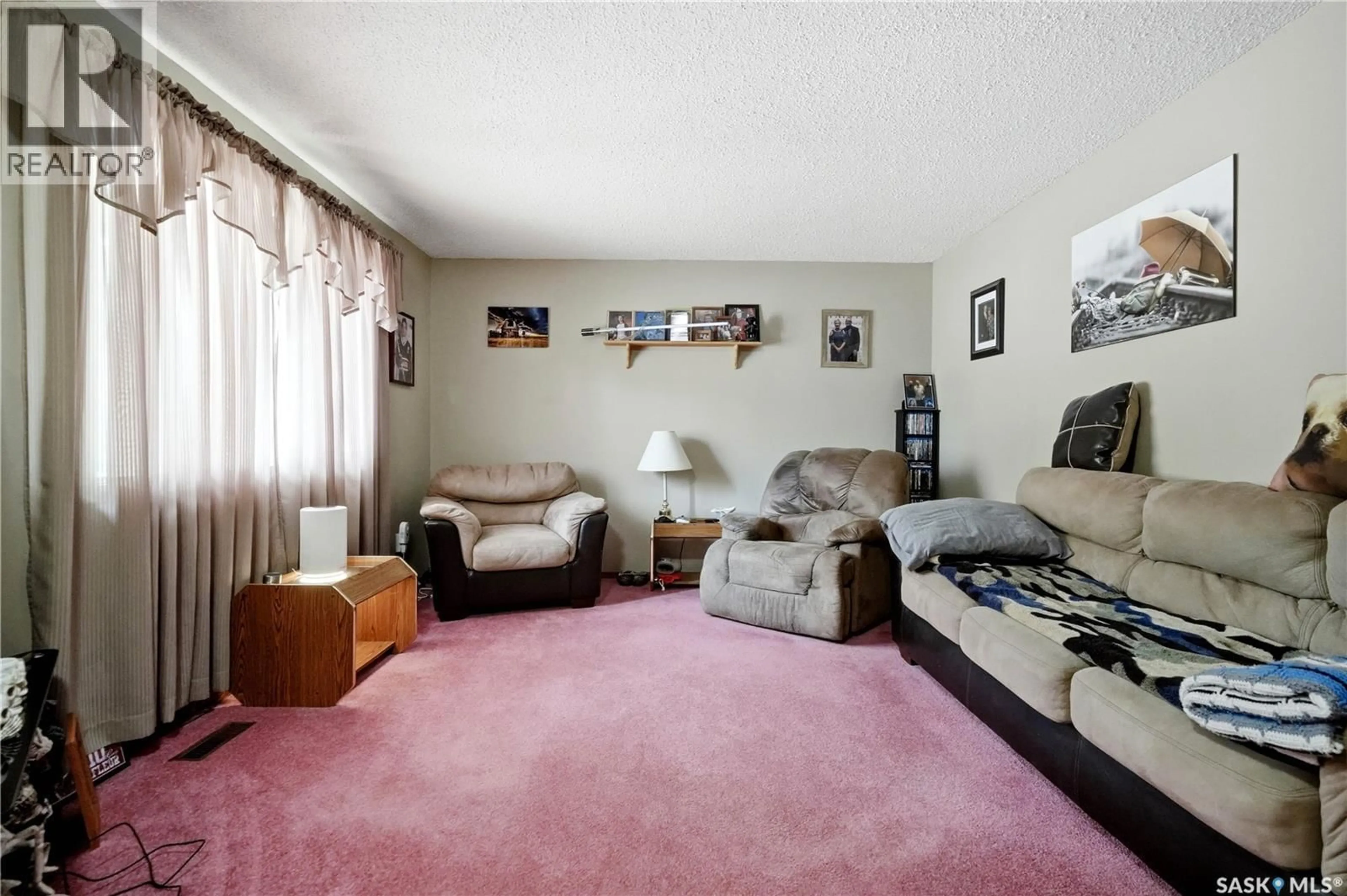 Living room with furniture, carpet floor for 7 UPLAND DRIVE, Regina Saskatchewan S4R0B8