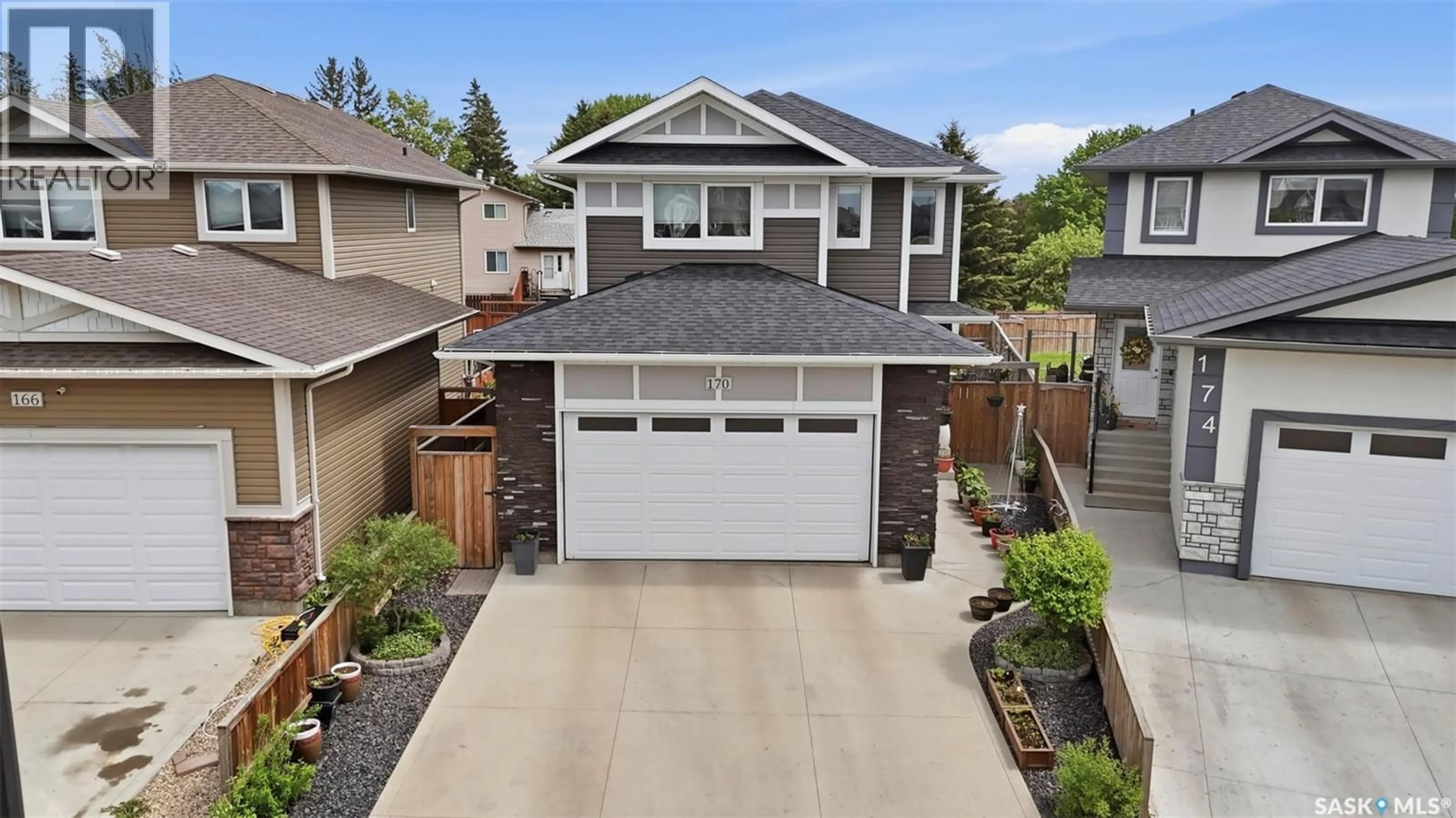Home with vinyl exterior material, street for 170 PALLISER COURT, Saskatoon Saskatchewan S7L4P9