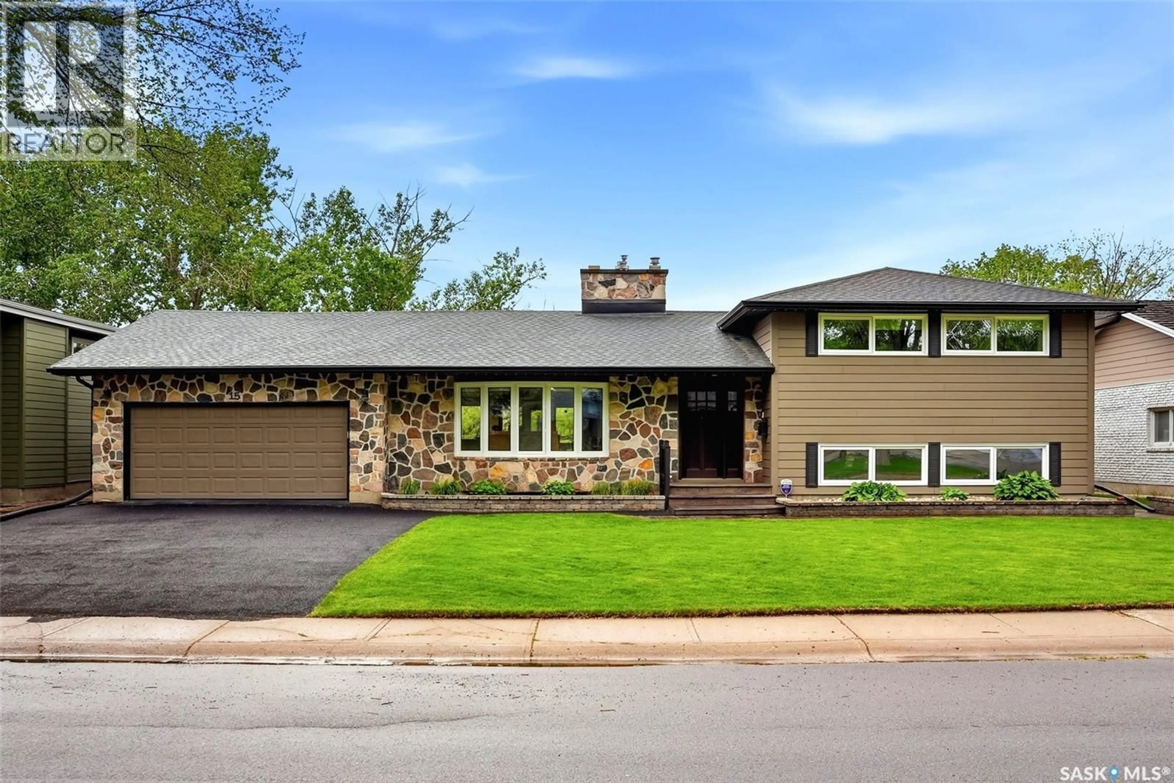 Home with brick exterior material, street for 15 PARKWOOD ROAD, Regina Saskatchewan S4S2Z8