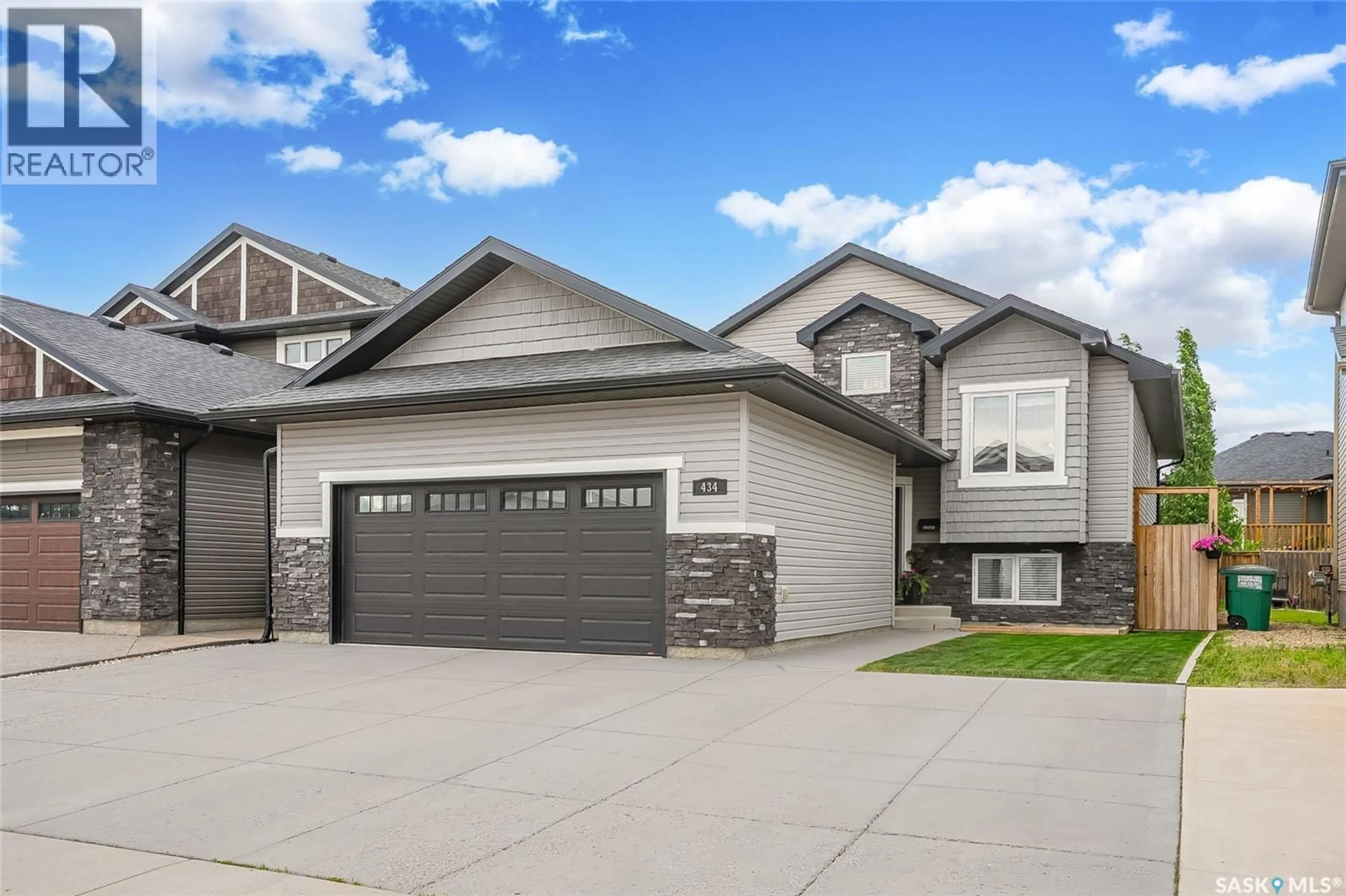 Home with vinyl exterior material, street for 434 LANGLOIS WAY, Saskatoon Saskatchewan S7T0S8