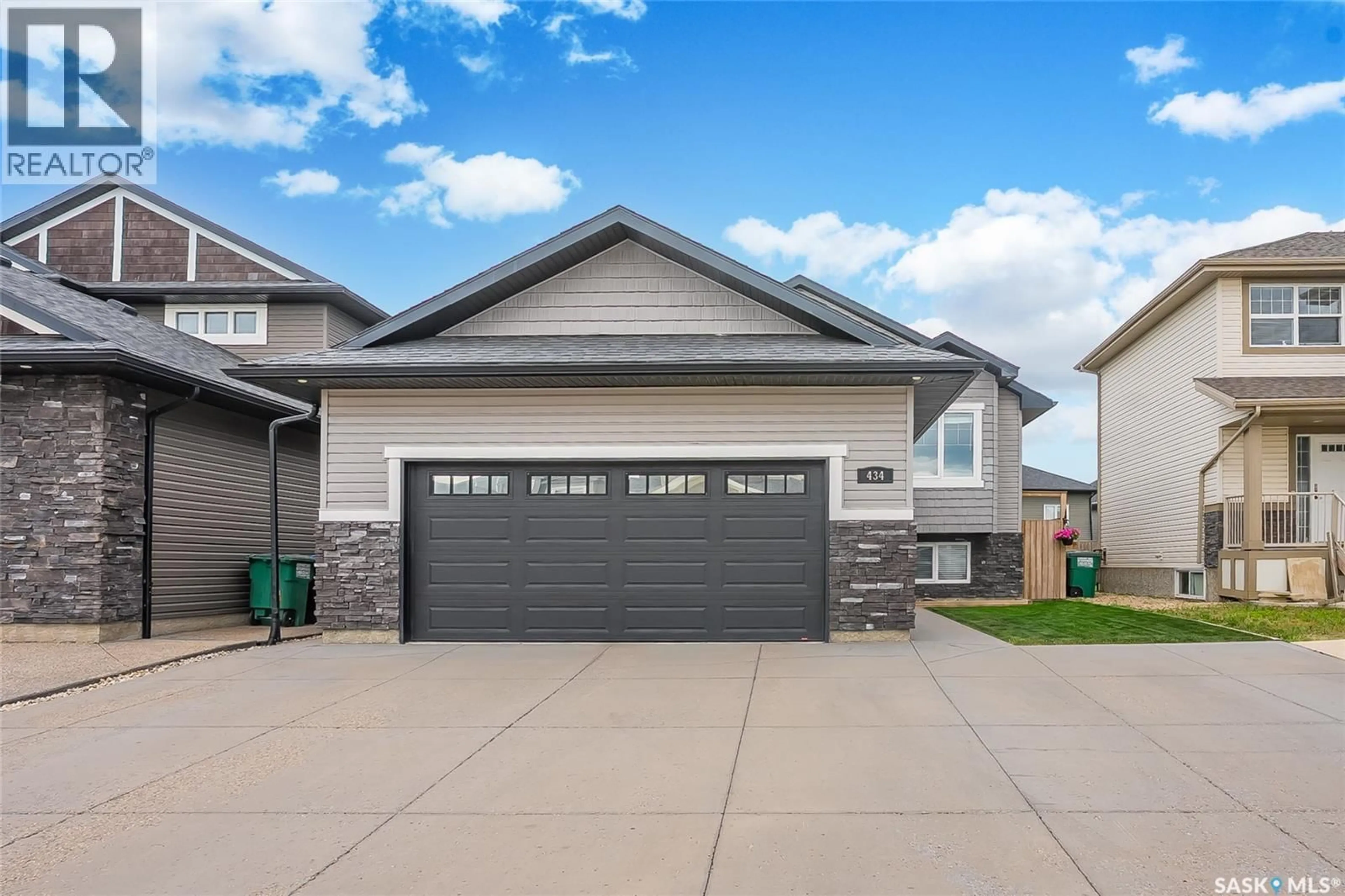 Home with vinyl exterior material, street for 434 LANGLOIS WAY, Saskatoon Saskatchewan S7T0S8