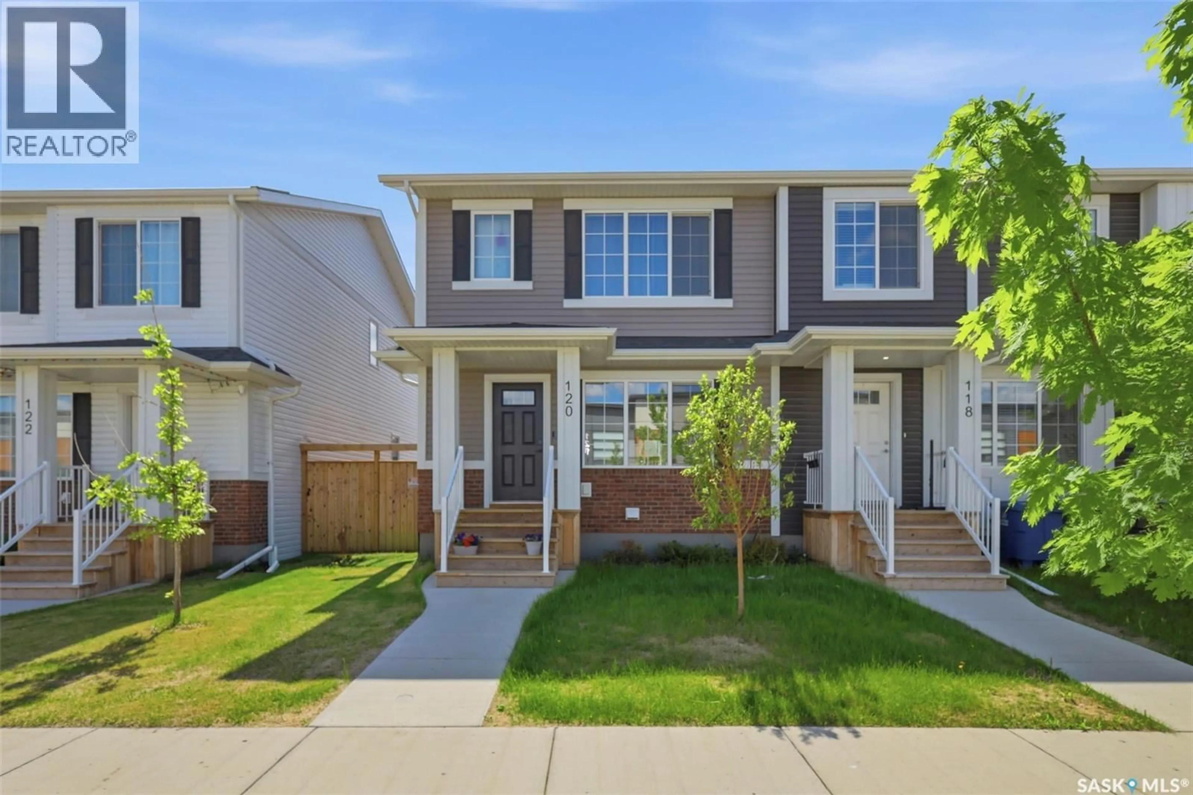Home with vinyl exterior material, street for 120 WESTFIELD ROAD, Saskatoon Saskatchewan S7V0Z8