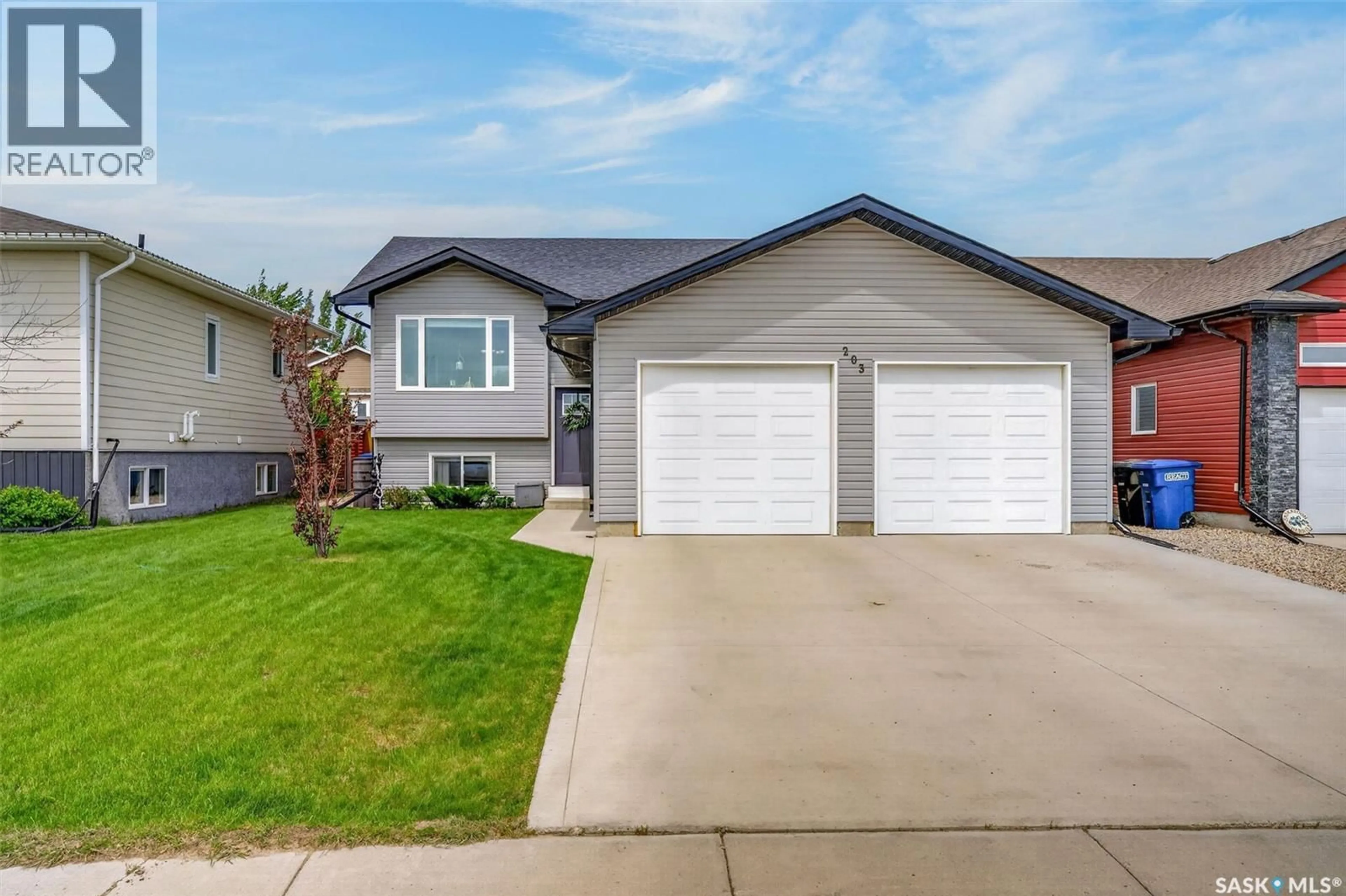 Home with vinyl exterior material, street for 203 SASKATCHEWAN AVENUE, Humboldt Saskatchewan S0K2A0