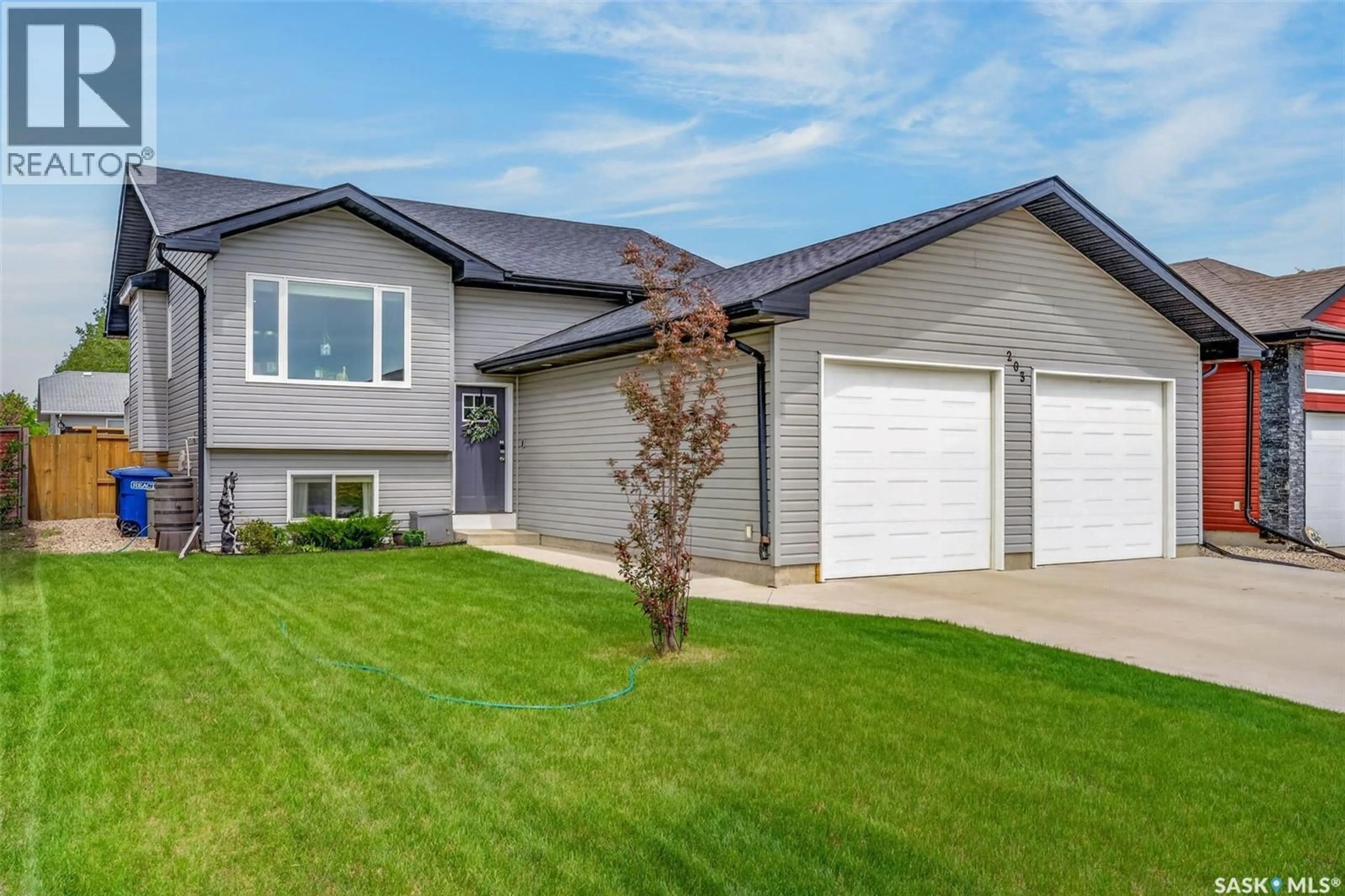Home with vinyl exterior material, street for 203 SASKATCHEWAN AVENUE, Humboldt Saskatchewan S0K2A0