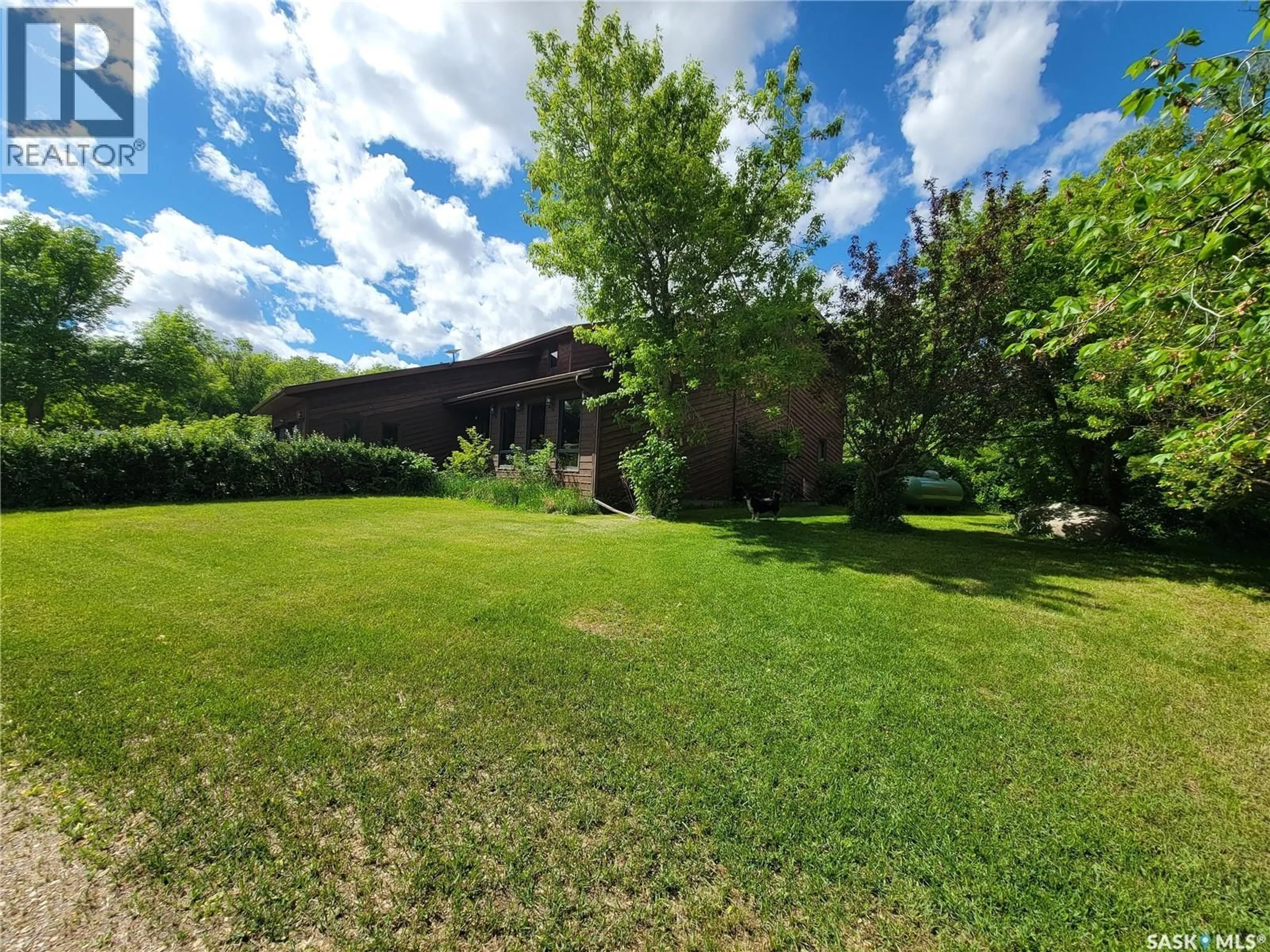 A pic from outside/outdoor area/front of a property/back of a property/a pic from drone, unknown for REED ACREAGE, Grass Lake Rm No. 381 Saskatchewan S0K3N0