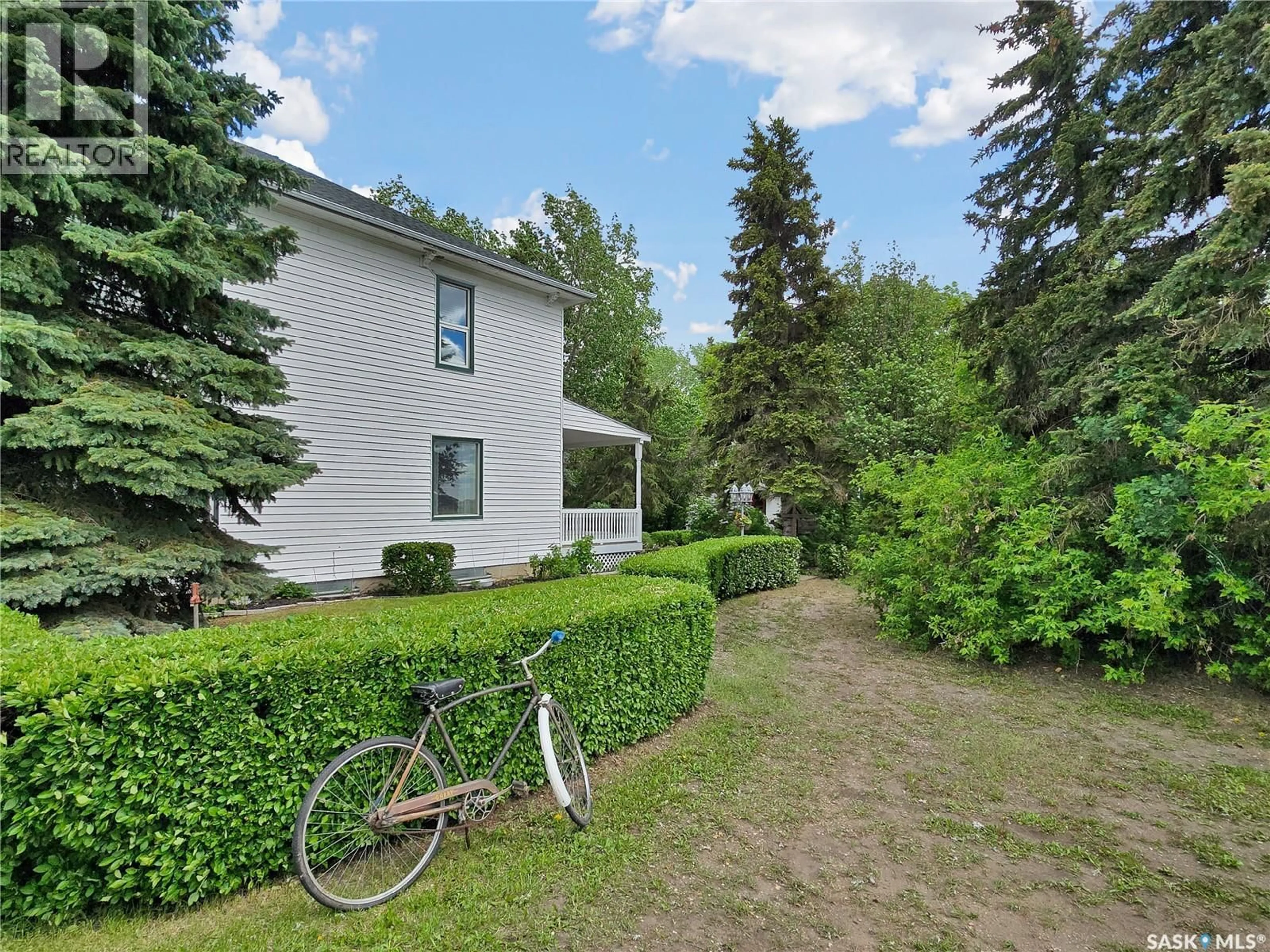 A pic from outside/outdoor area/front of a property/back of a property/a pic from drone, street for SPEISER ACREAGE, Rosthern Rm No. 403 Saskatchewan S0K2H0