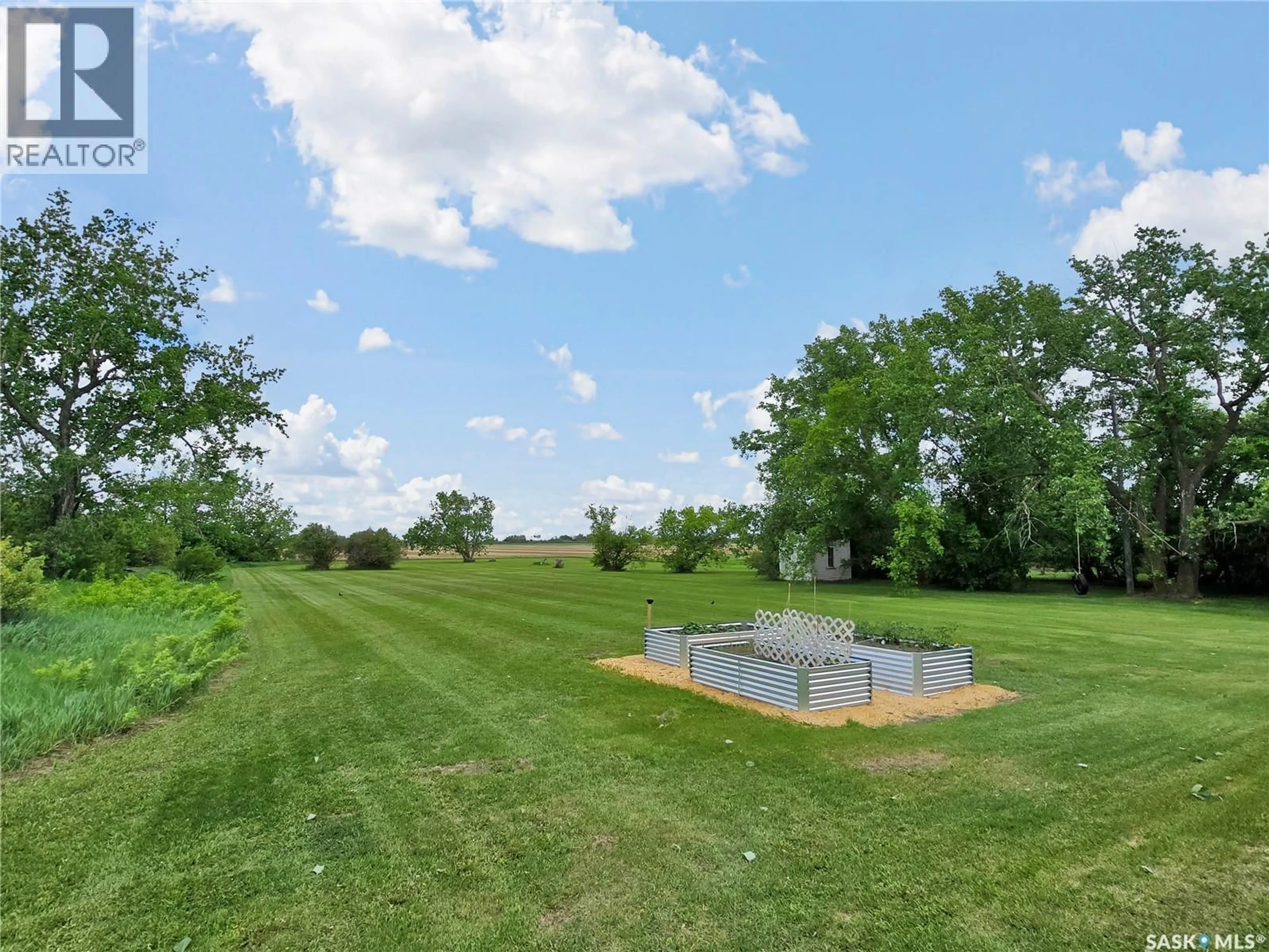 A pic from outside/outdoor area/front of a property/back of a property/a pic from drone, water/lake/river/ocean view for SPEISER ACREAGE, Rosthern Rm No. 403 Saskatchewan S0K2H0