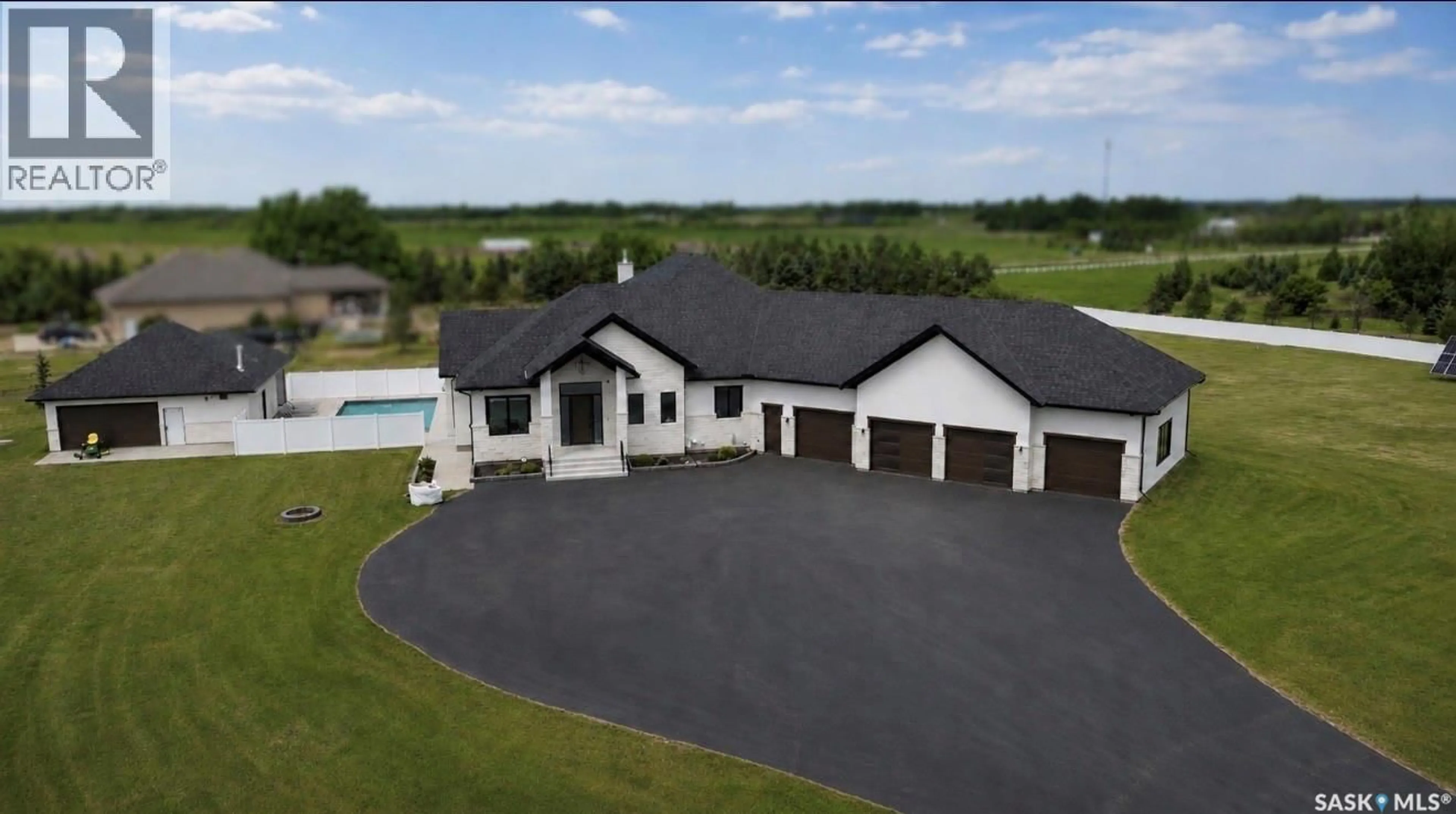 A pic from outside/outdoor area/front of a property/back of a property/a pic from drone, unknown for 50 MANDALAY BAY, Corman Park Rm No. 344 Saskatchewan S7T1E3
