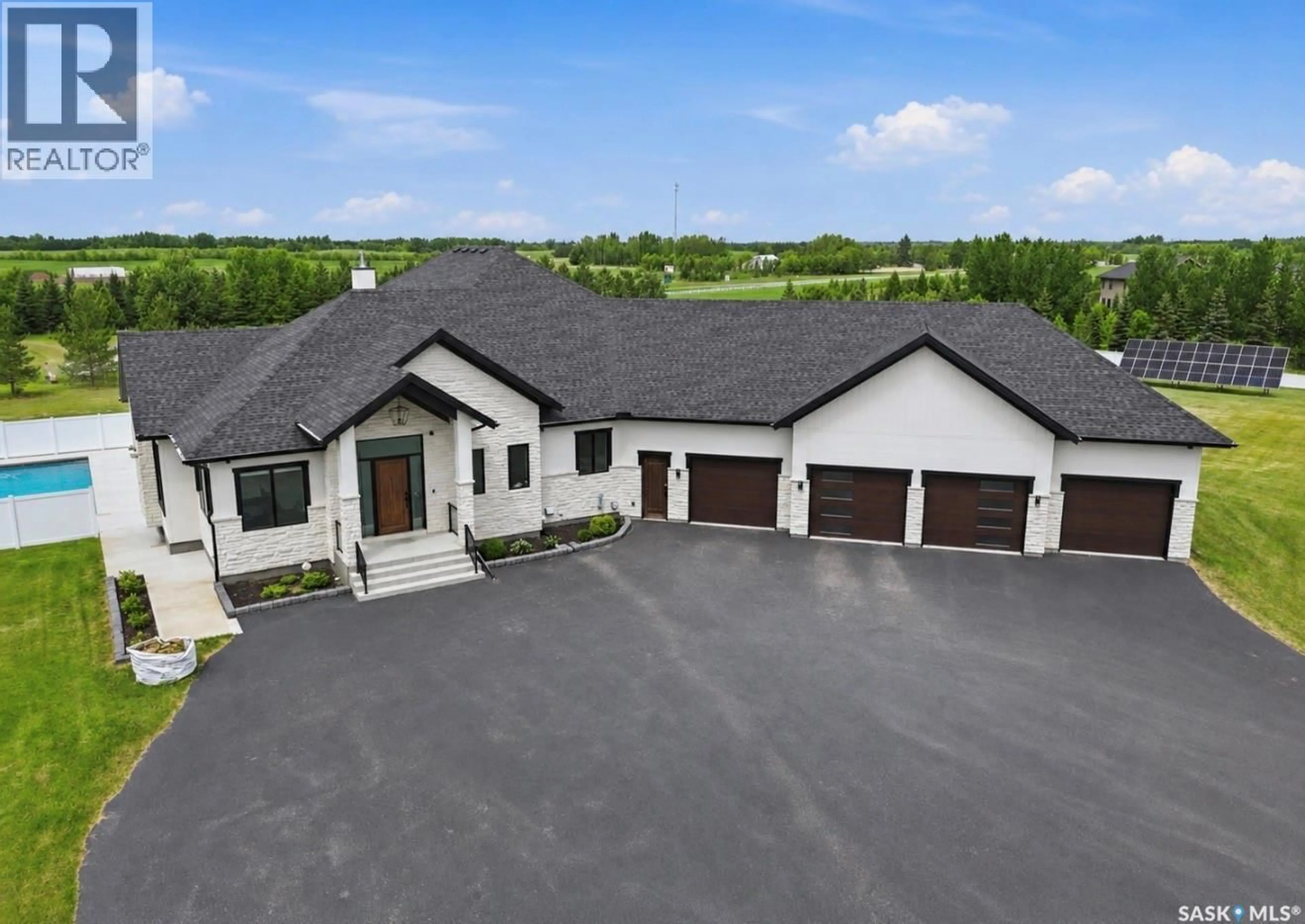 A pic from outside/outdoor area/front of a property/back of a property/a pic from drone, unknown for 50 MANDALAY BAY, Corman Park Rm No. 344 Saskatchewan S7T1E3