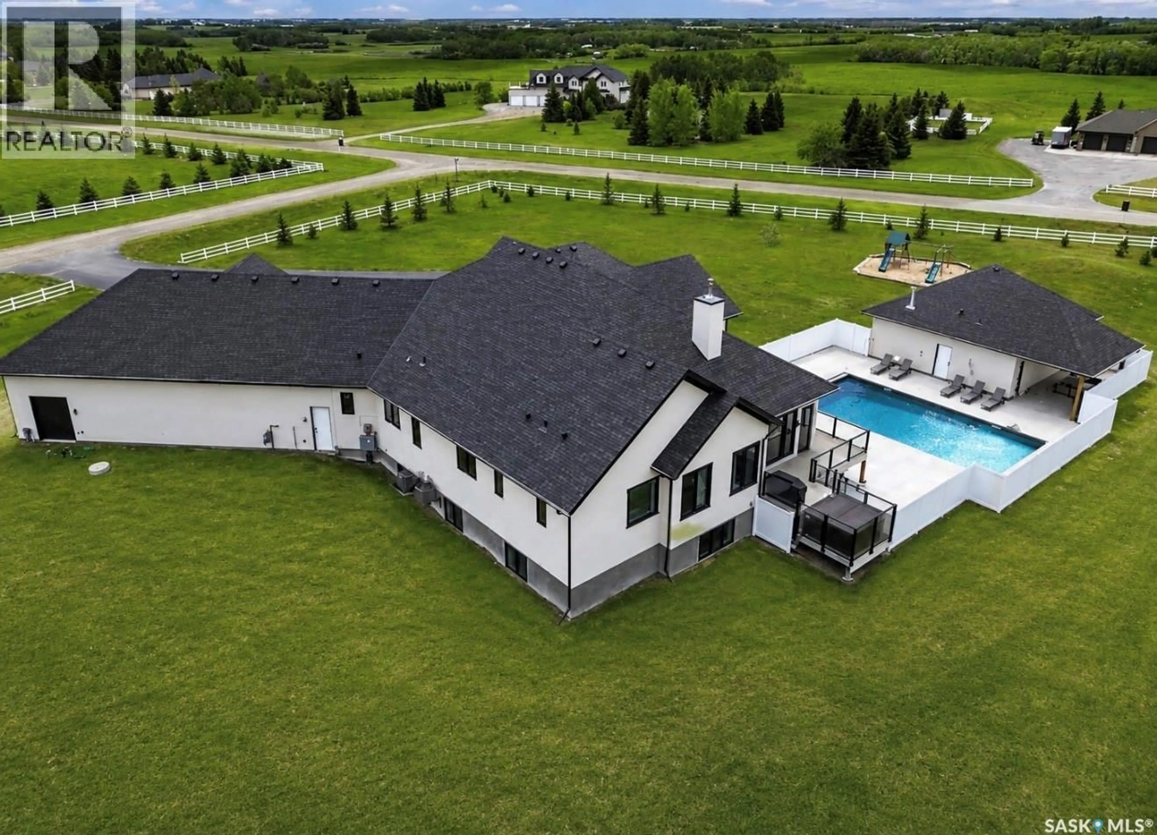 A pic from outside/outdoor area/front of a property/back of a property/a pic from drone, unknown for 50 MANDALAY BAY, Corman Park Rm No. 344 Saskatchewan S7T1E3
