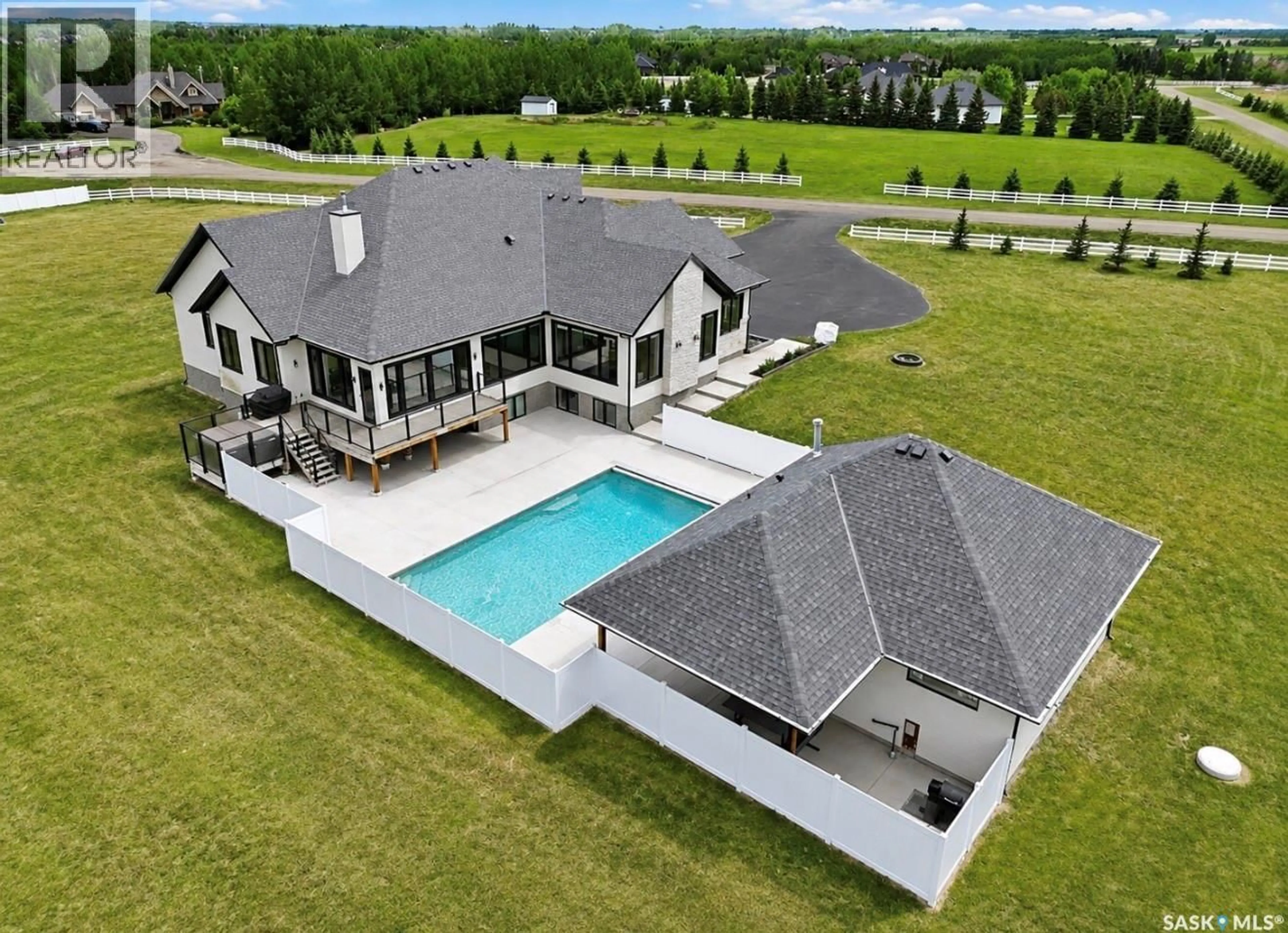 A pic from outside/outdoor area/front of a property/back of a property/a pic from drone, water/lake/river/ocean view for 50 MANDALAY BAY, Corman Park Rm No. 344 Saskatchewan S7T1E3