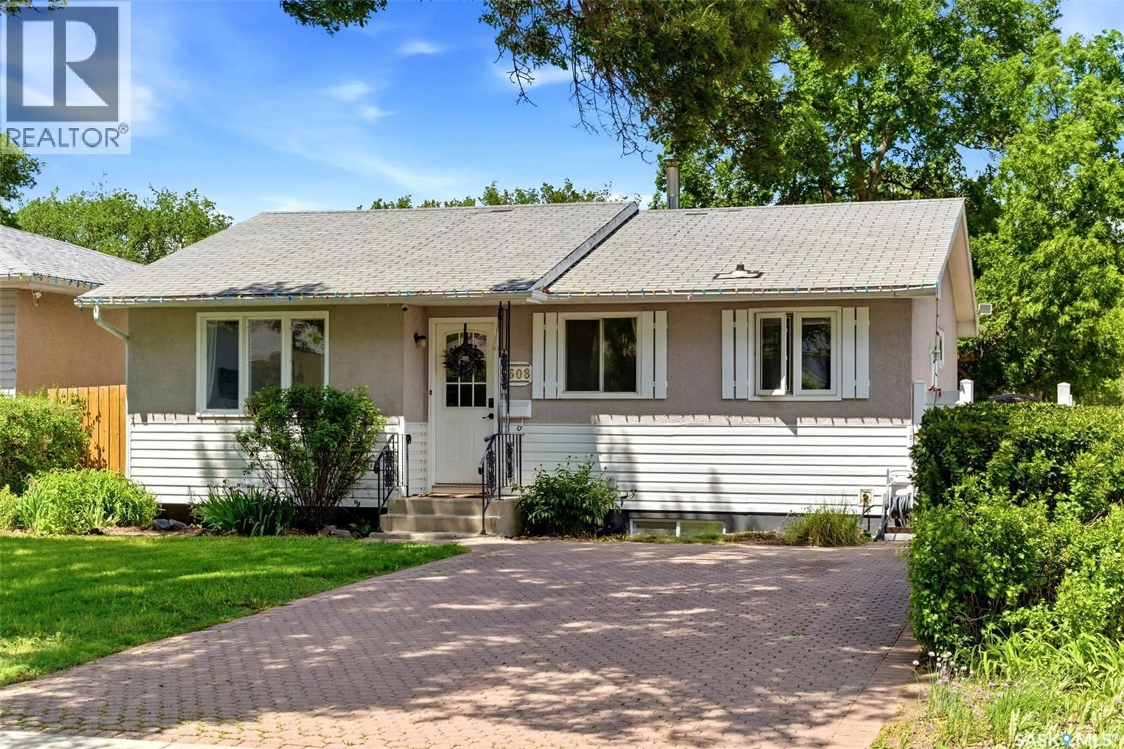 Home with vinyl exterior material, street for 5608 2ND AVENUE, Regina Saskatchewan S4R5M5