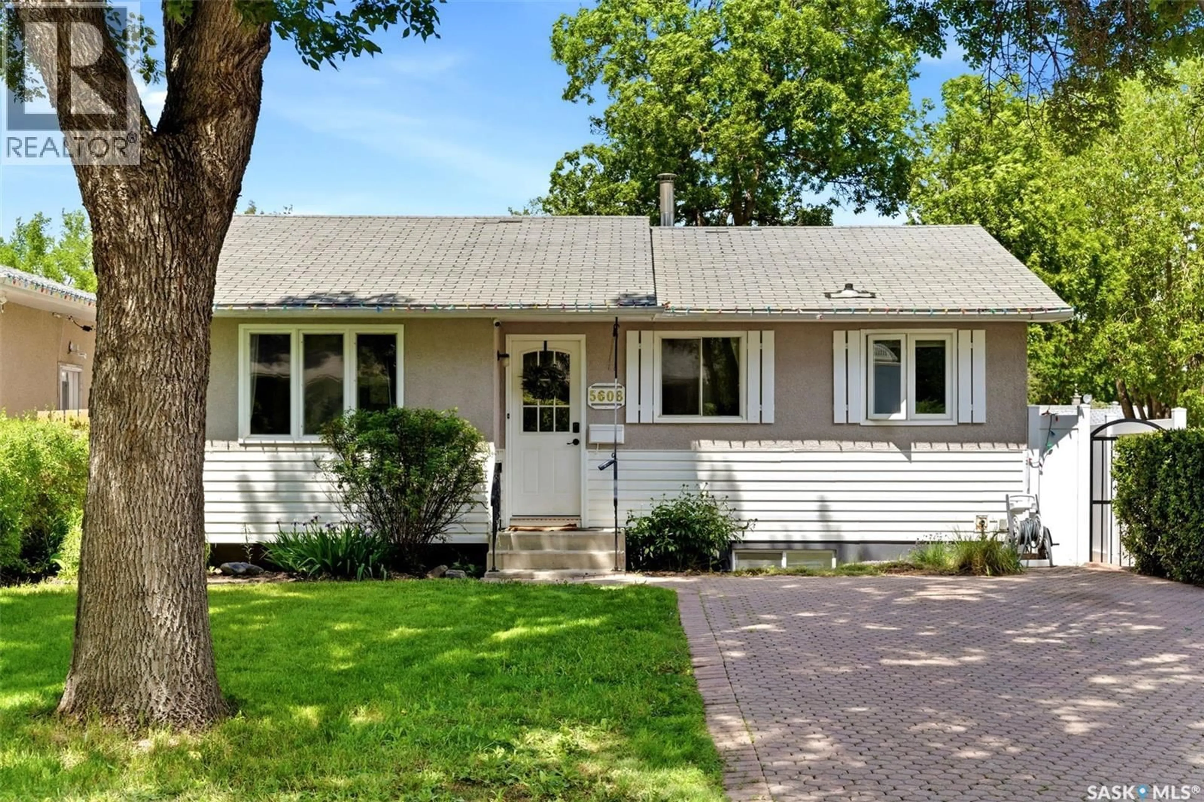 Home with vinyl exterior material, street for 5608 2ND AVENUE, Regina Saskatchewan S4R5M5