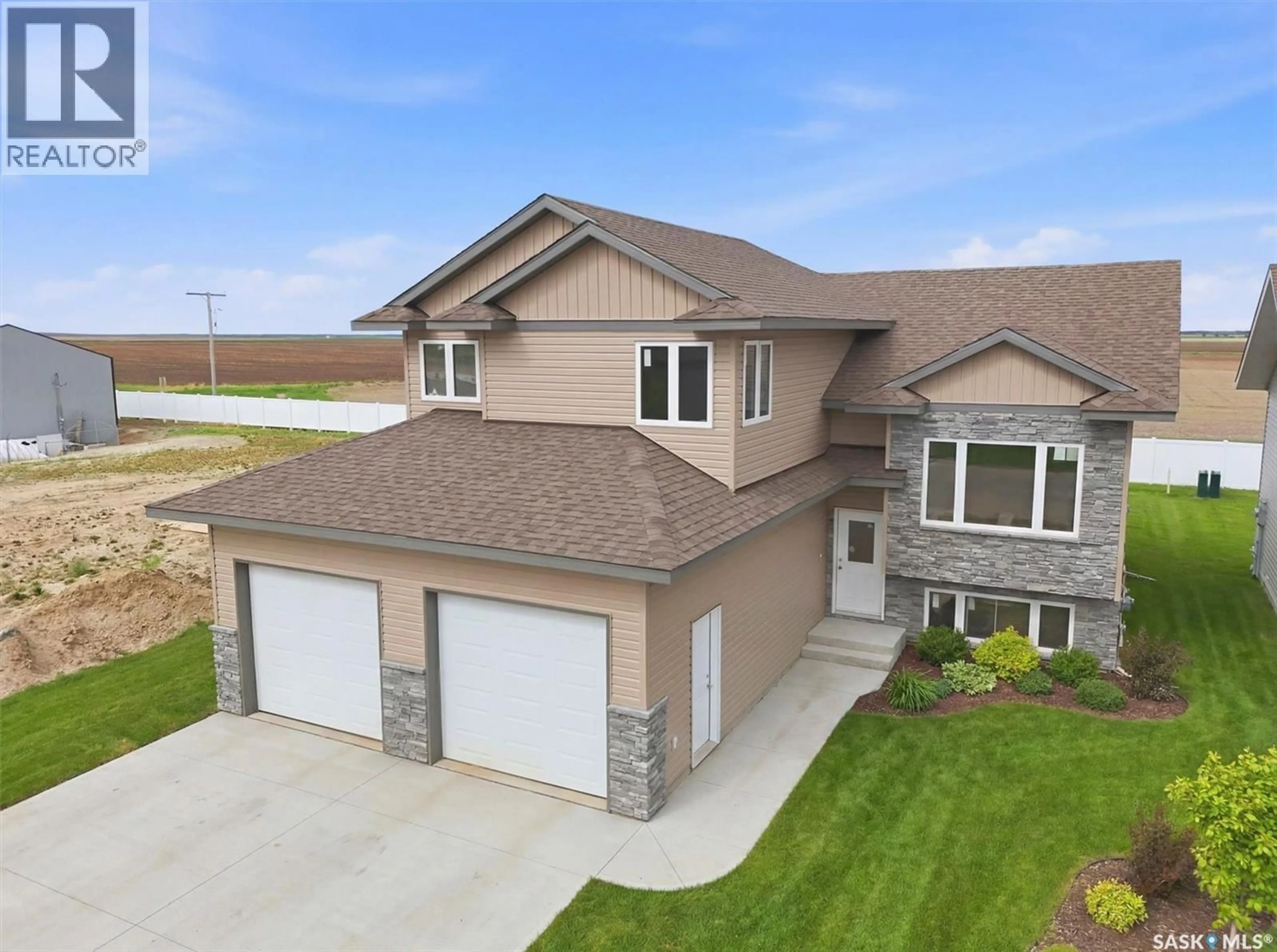 Home with brick exterior material, street for 270 PRAIRIE DAWN DRIVE, Dundurn Saskatchewan S0K1K1