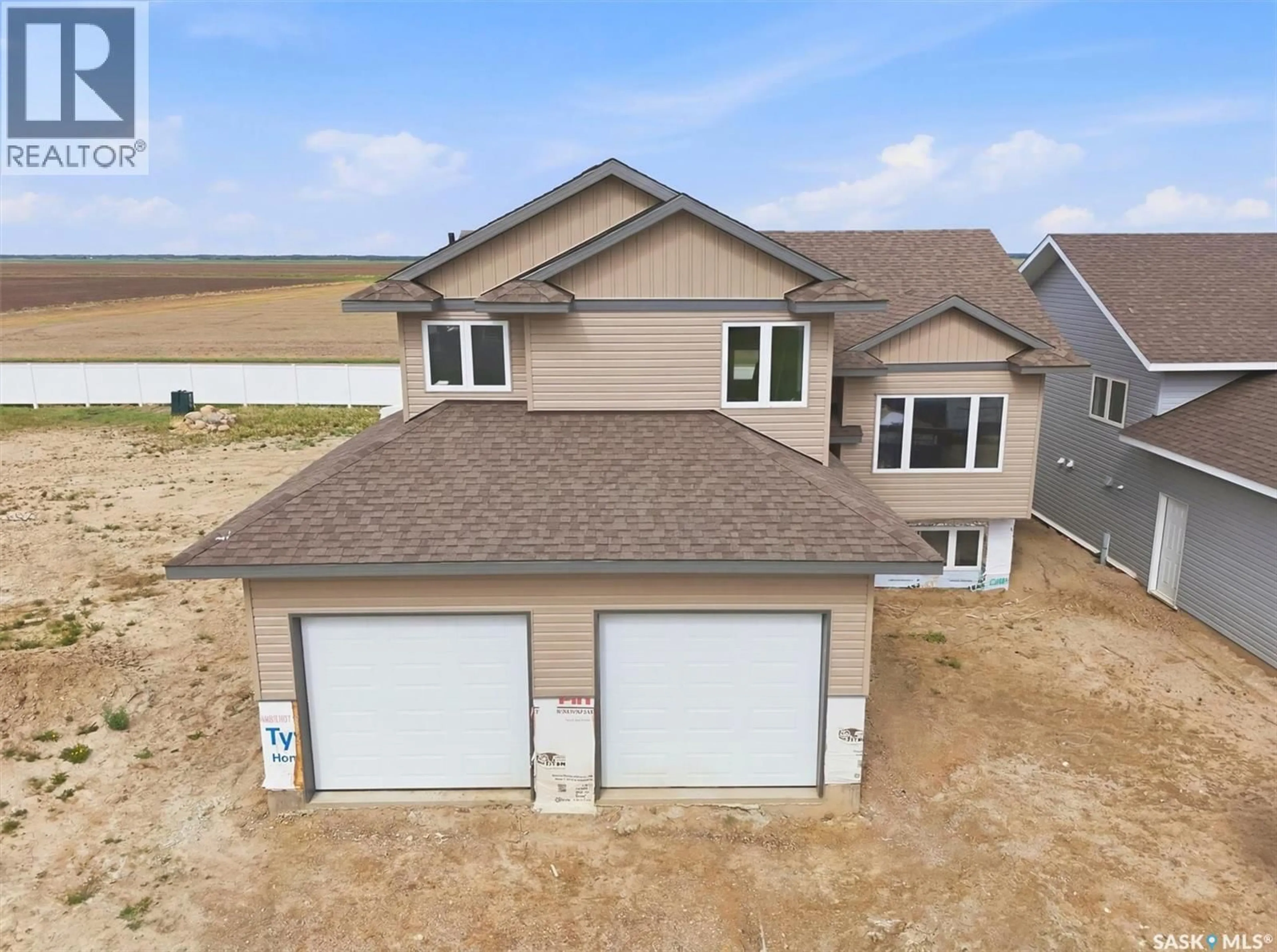 A pic from outside/outdoor area/front of a property/back of a property/a pic from drone, building for 270 PRAIRIE DAWN DRIVE, Dundurn Saskatchewan S0K1K1