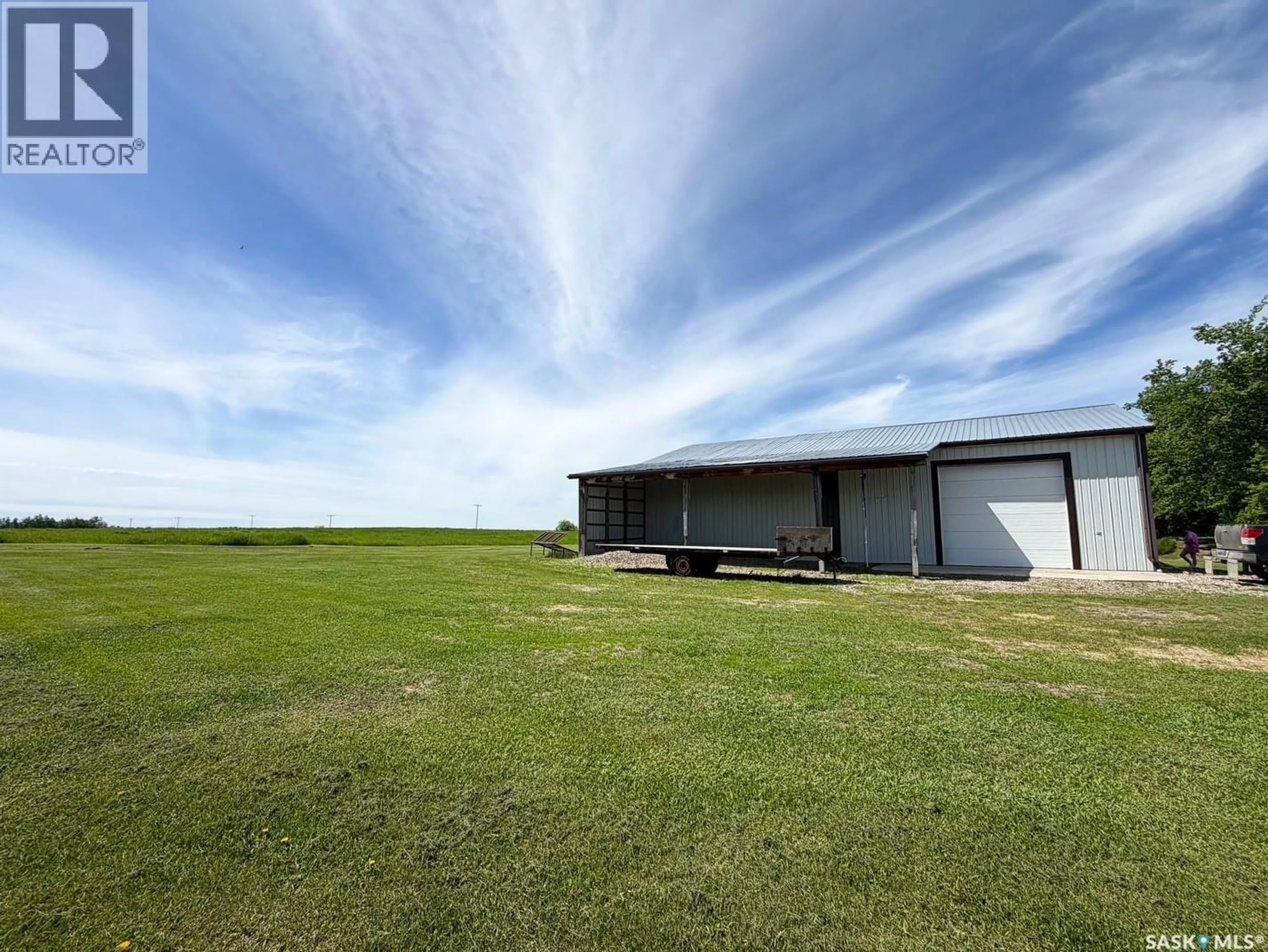 A pic from outside/outdoor area/front of a property/back of a property/a pic from drone, building for CABANA ACREAGE, Meadow Lake Rm No.588 Saskatchewan S9X1Y9