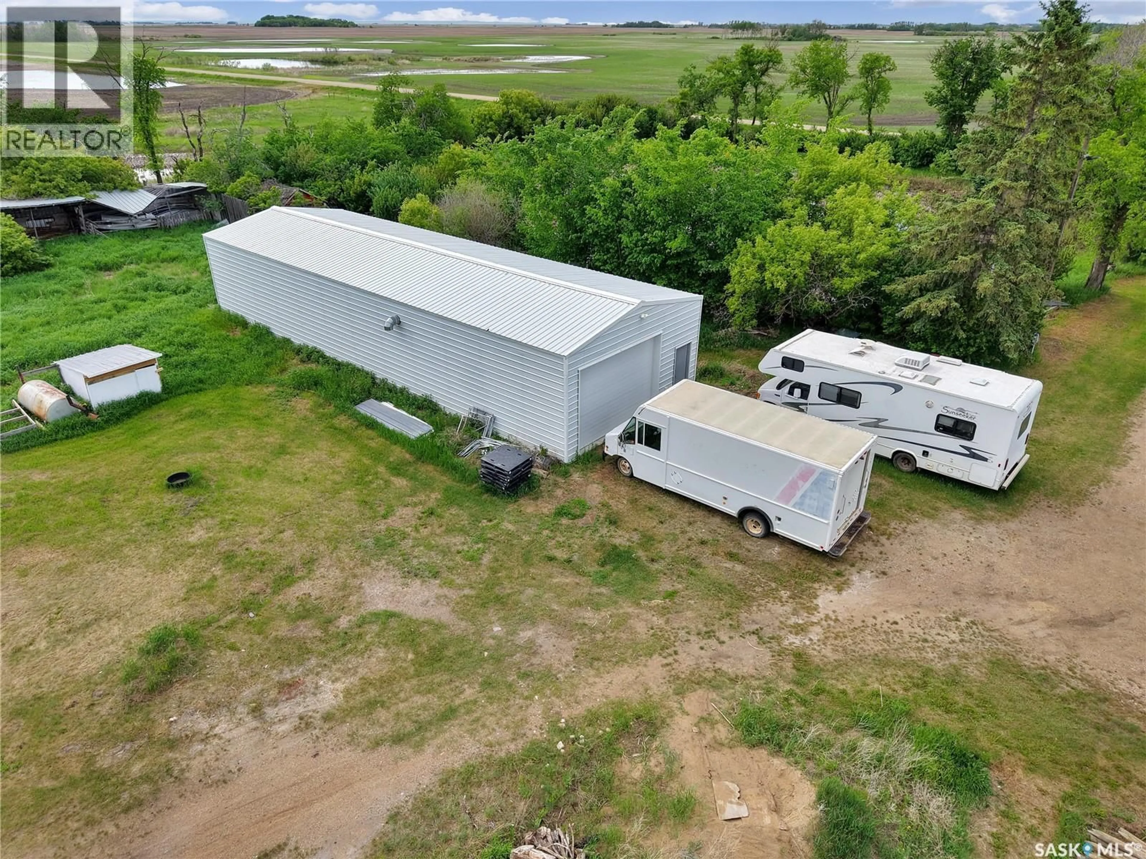 A pic from outside/outdoor area/front of a property/back of a property/a pic from drone, building for BARAN ACREAGE, Blaine Lake Rm No. 434 Saskatchewan S0J0J0